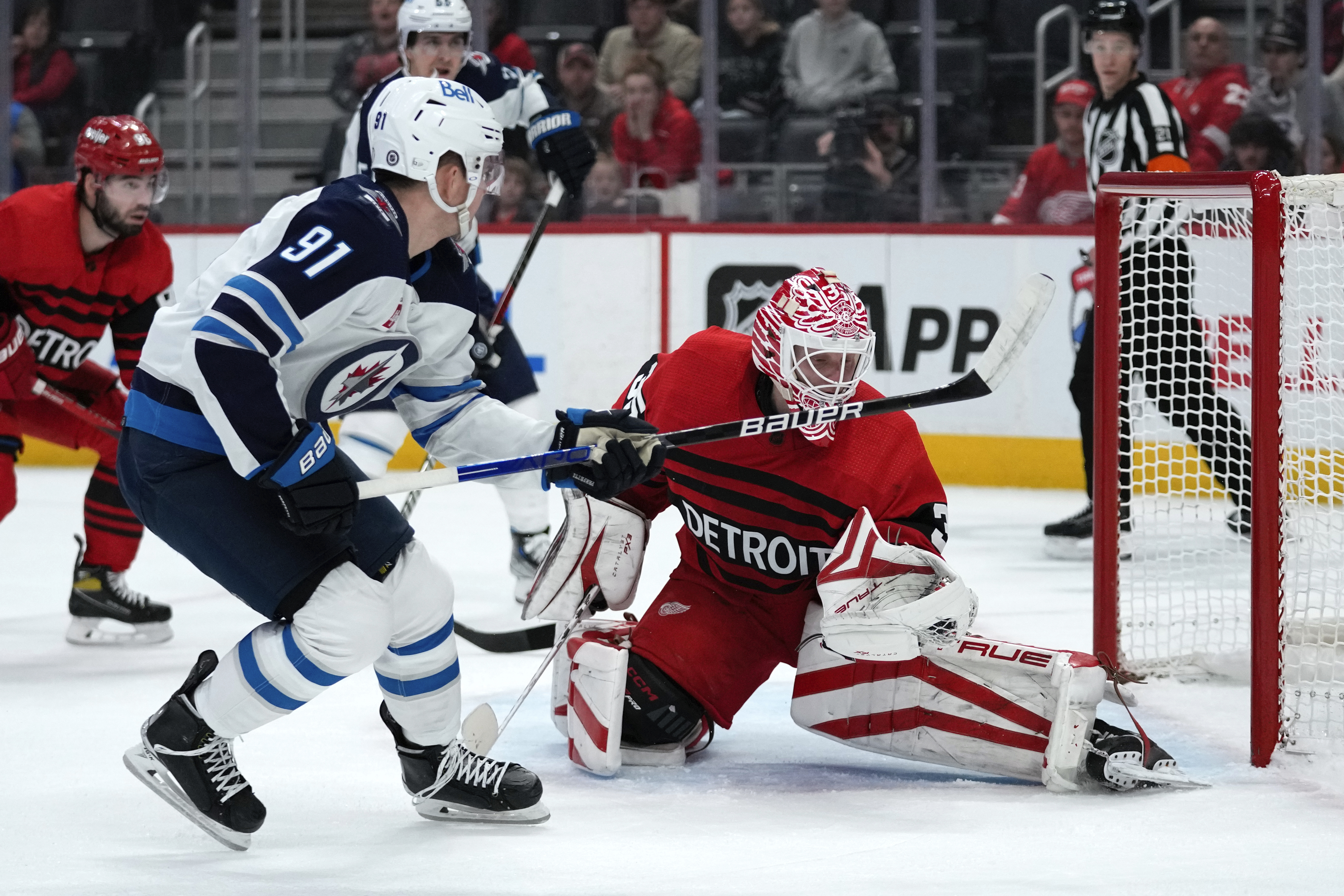 Jets' 5-game winning streak ends as Seider records 4 assists in Red Wings'  victory
