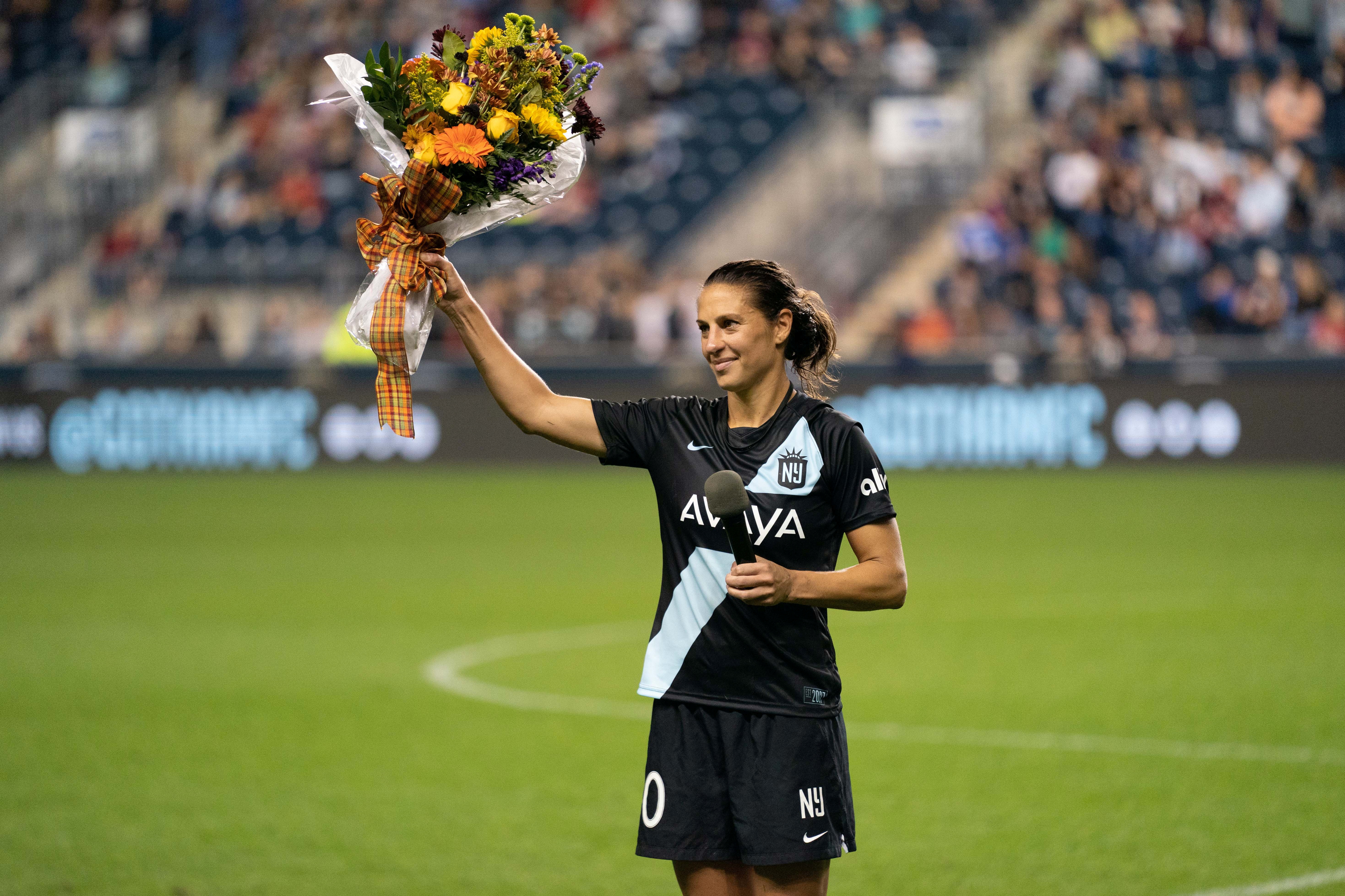 Carli Lloyd of NJ/NY Gotham FC signs a jersey after her farewell