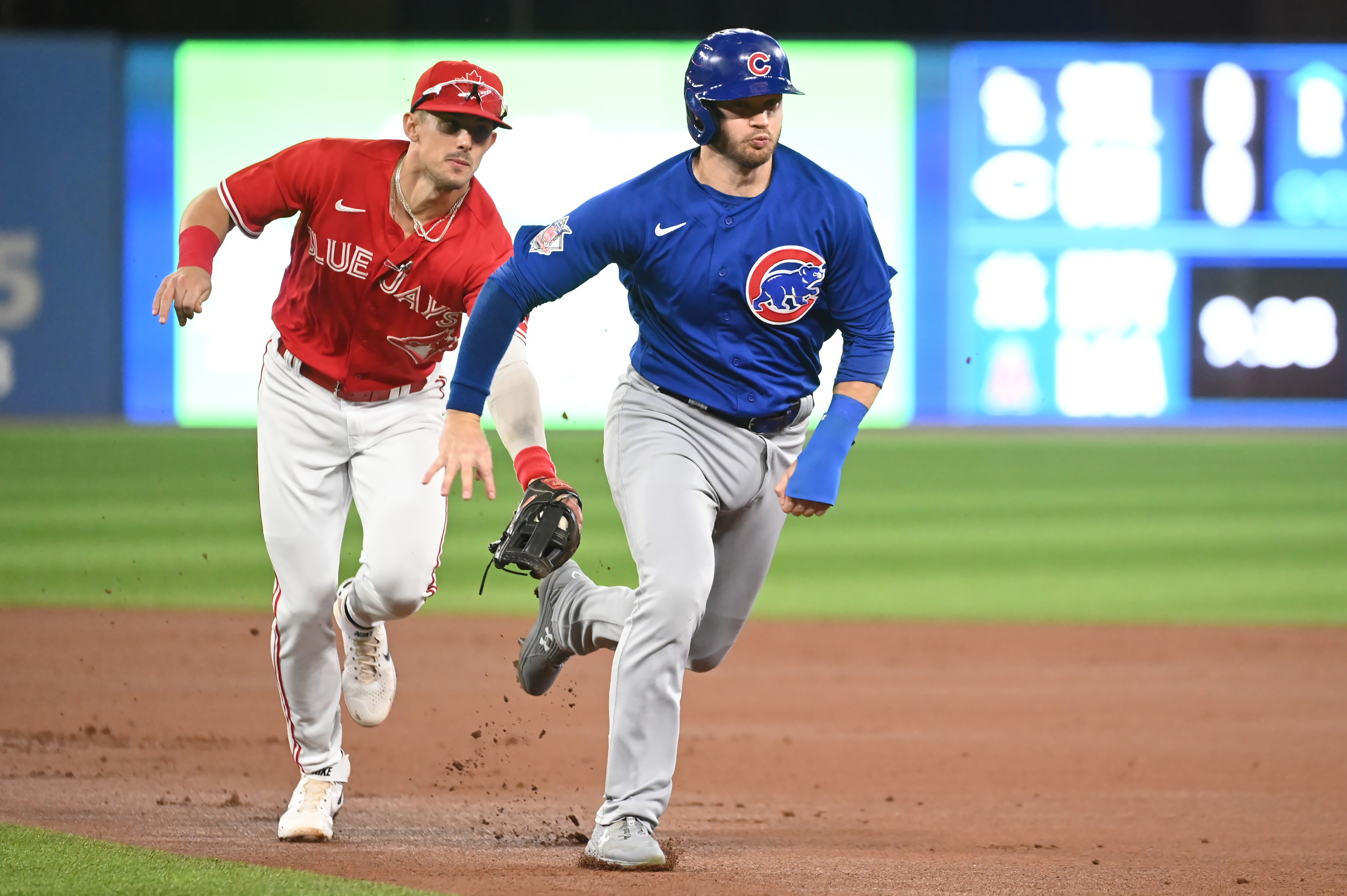 Jansen's clutch hitting lifts Blue Jays past Cubs 5-4 in 11