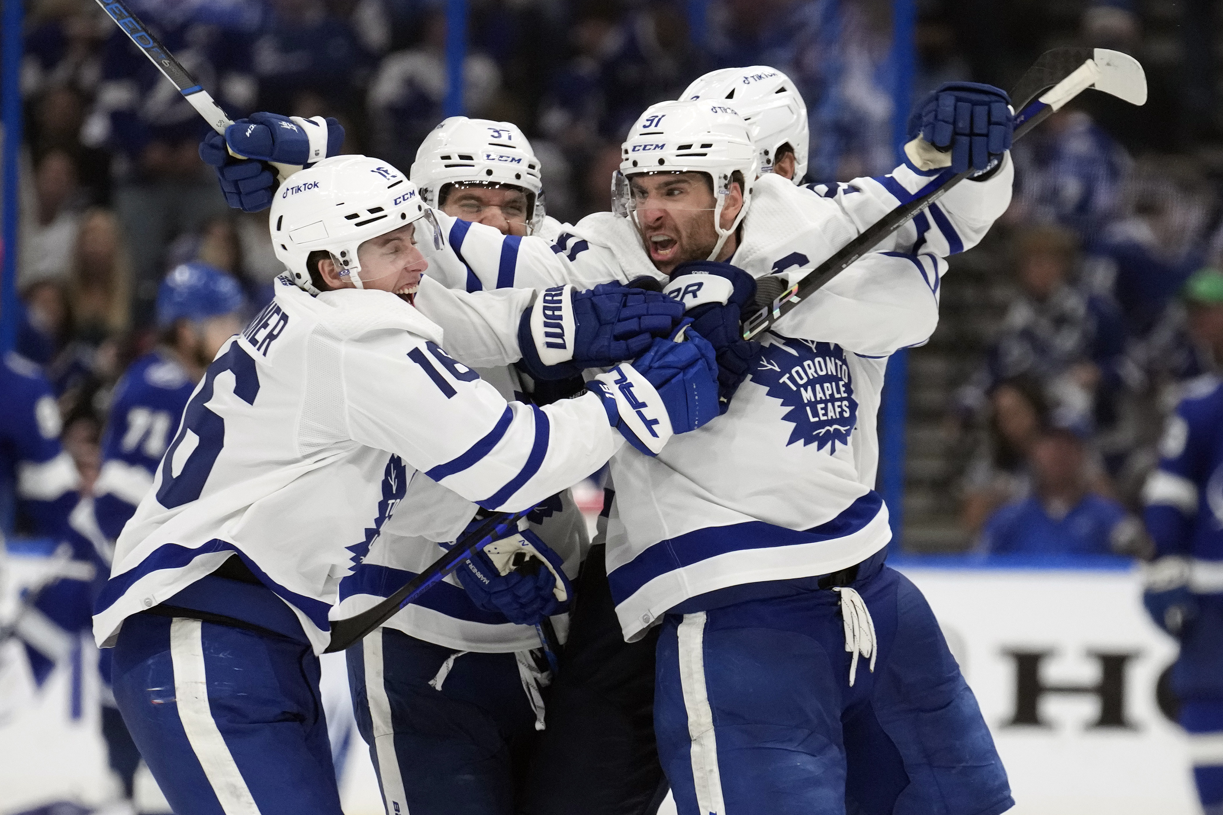 Toronto Maple Leafs defeat Tampa Bay Lightning 2-1 in overtime to advance in NHL playoffs