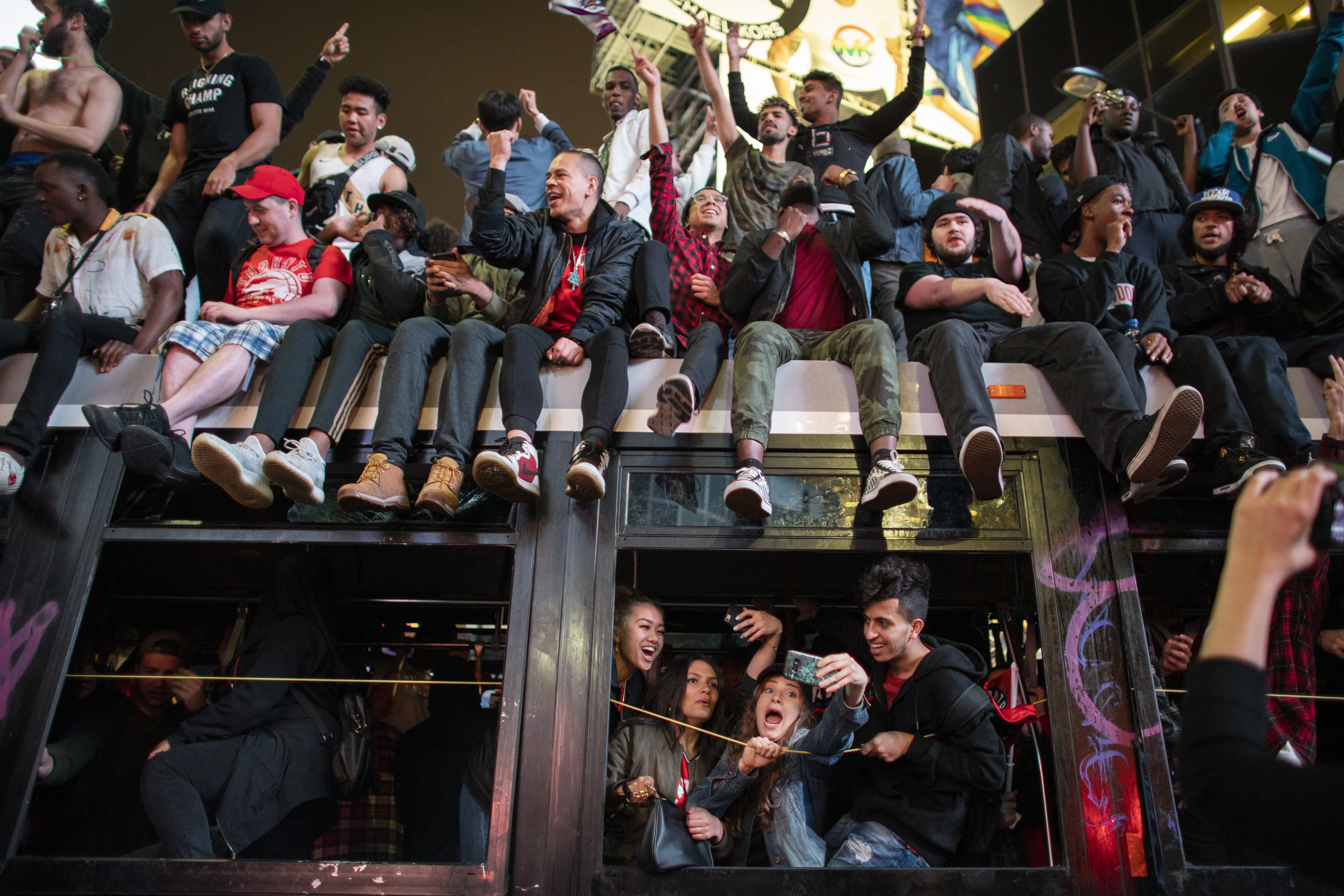 Picture of the 2019 NBA Champions logo on the bus as the Toronto Raptors  hold their victory parade after beating the Golden State Warriors in the NBA  Finals in Toronto. June 17