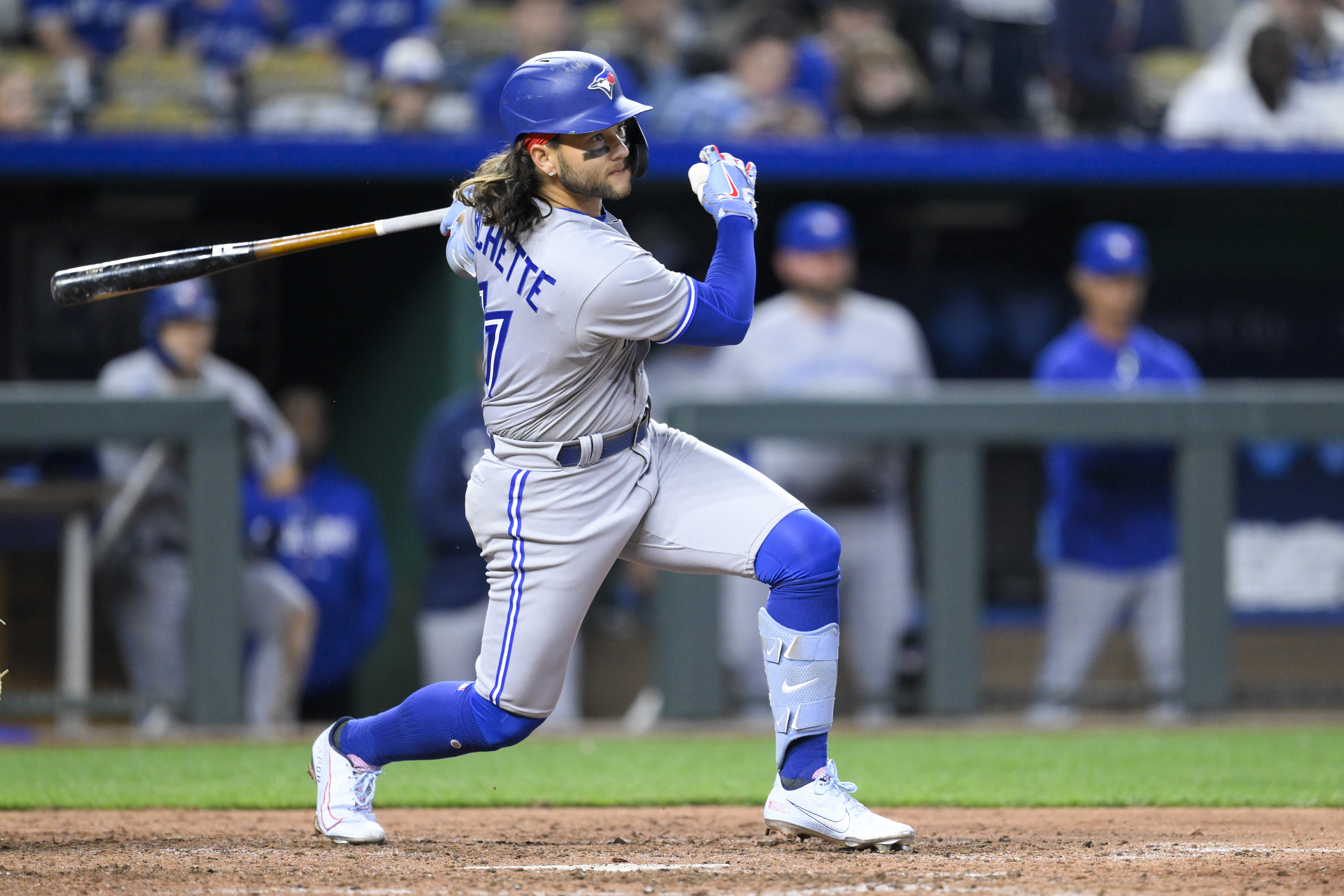 Singer, Lopez lead Royals past Blue Jays 9-5 for 1st win