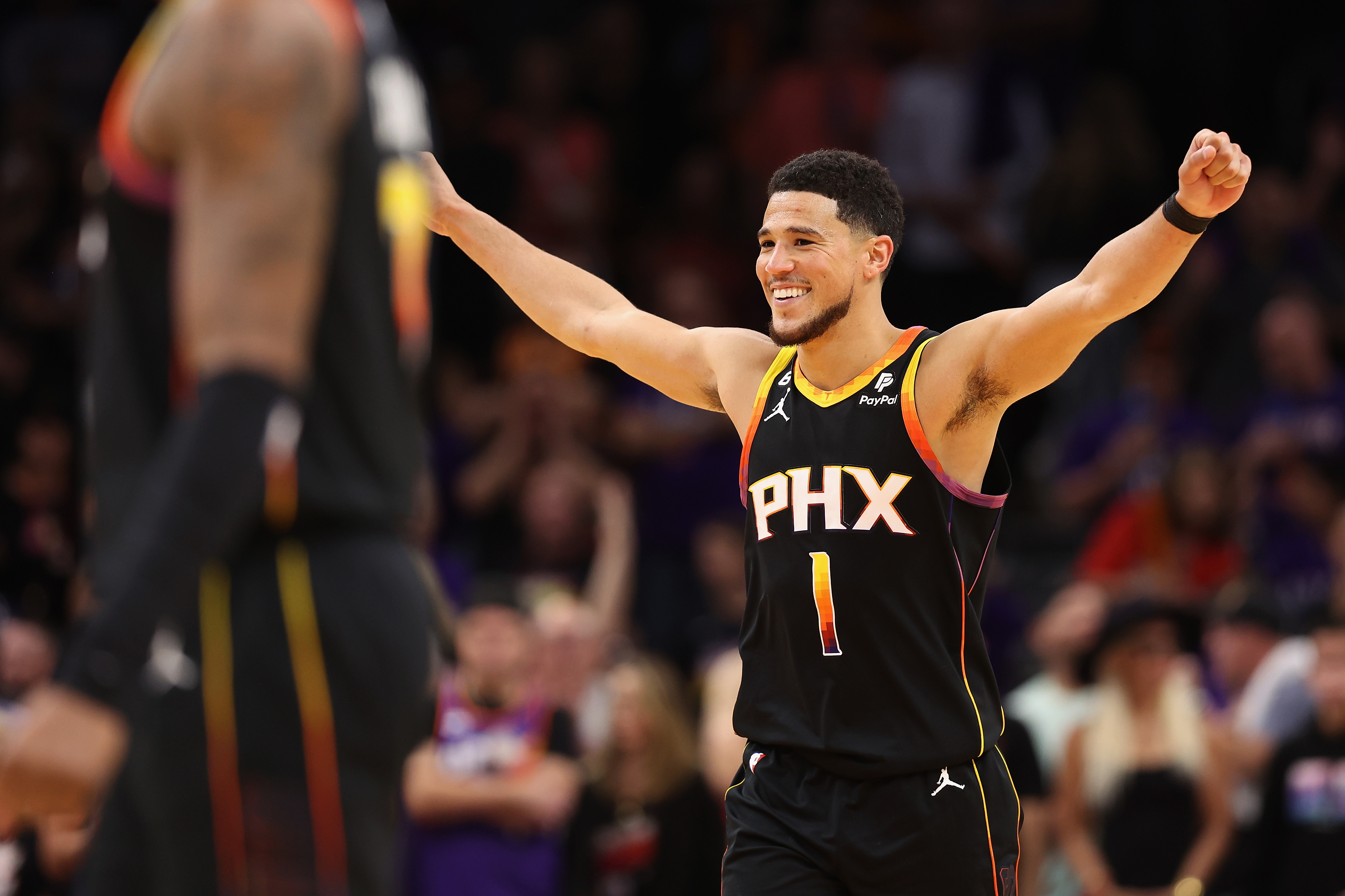 Booker scores 47, Durant adds 39, Suns beat Nuggets 121-114