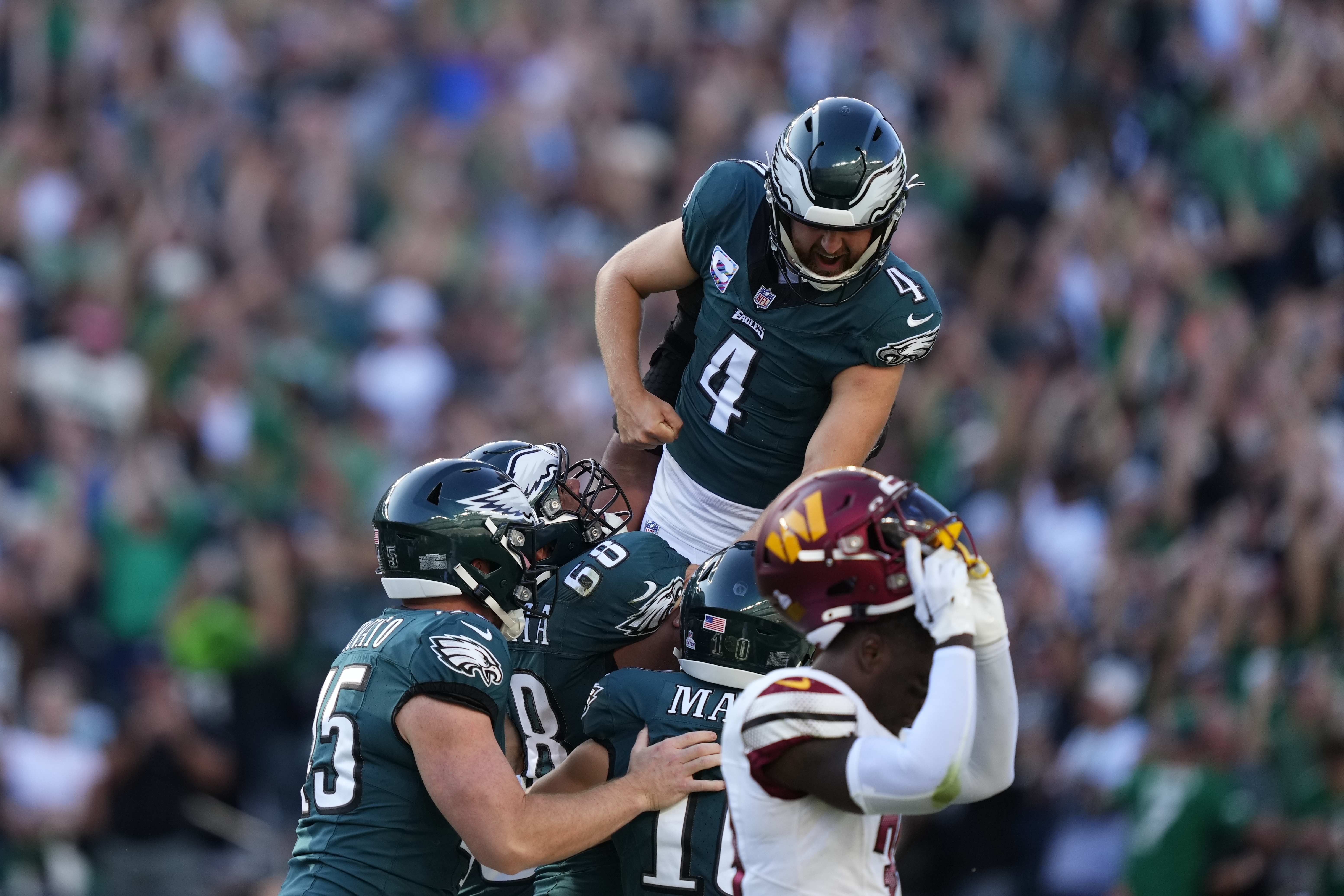 Jalen Hurts throws for 319 yards, Josh Elliott's 54-yarder lifts 4-0 Eagles  past Commanders in OT - The Globe and Mail