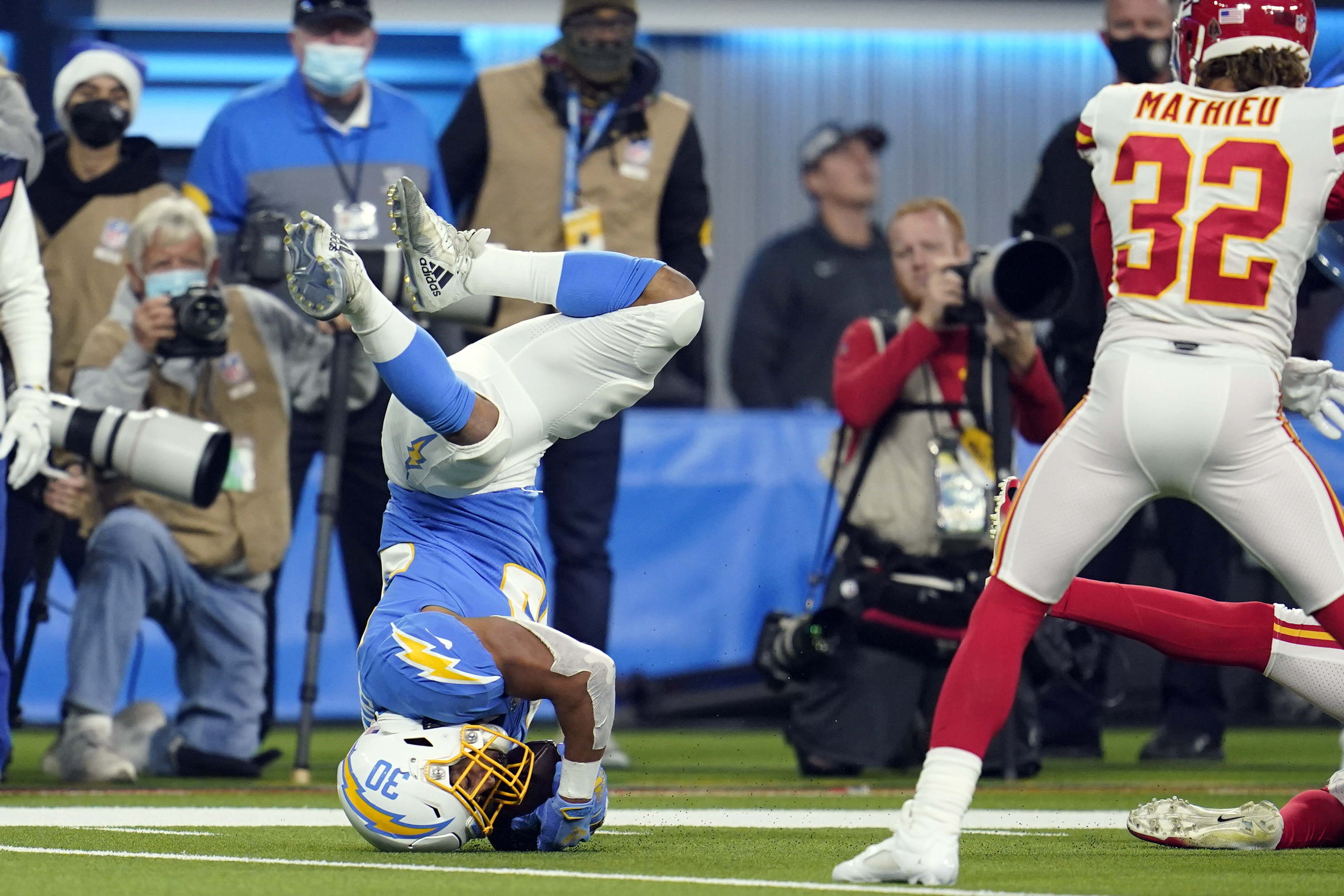 Chiefs beat Chargers in overtime on two late Travis Kelce