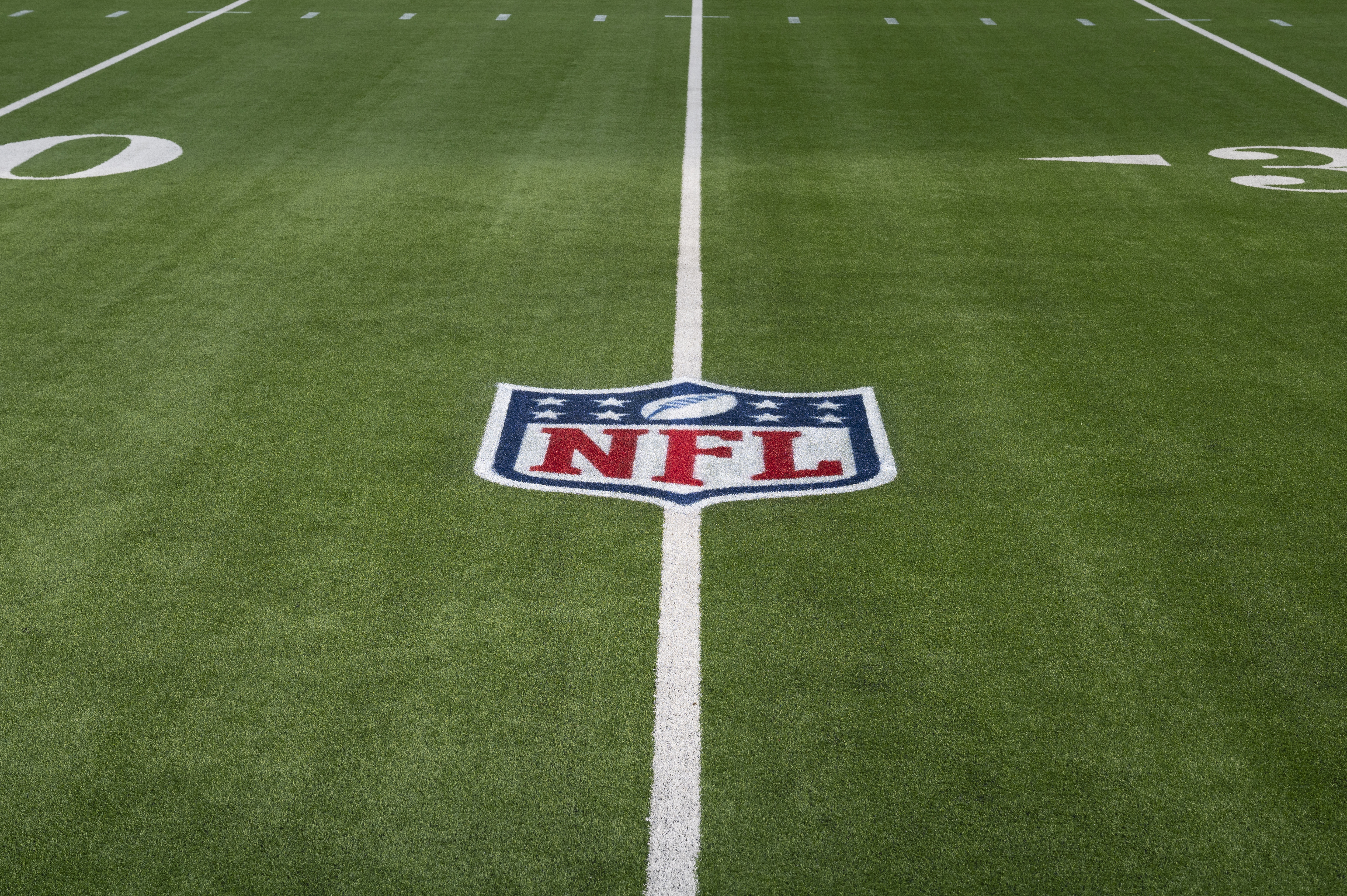 NFLPA renews call for natural grass after Rodgers injury