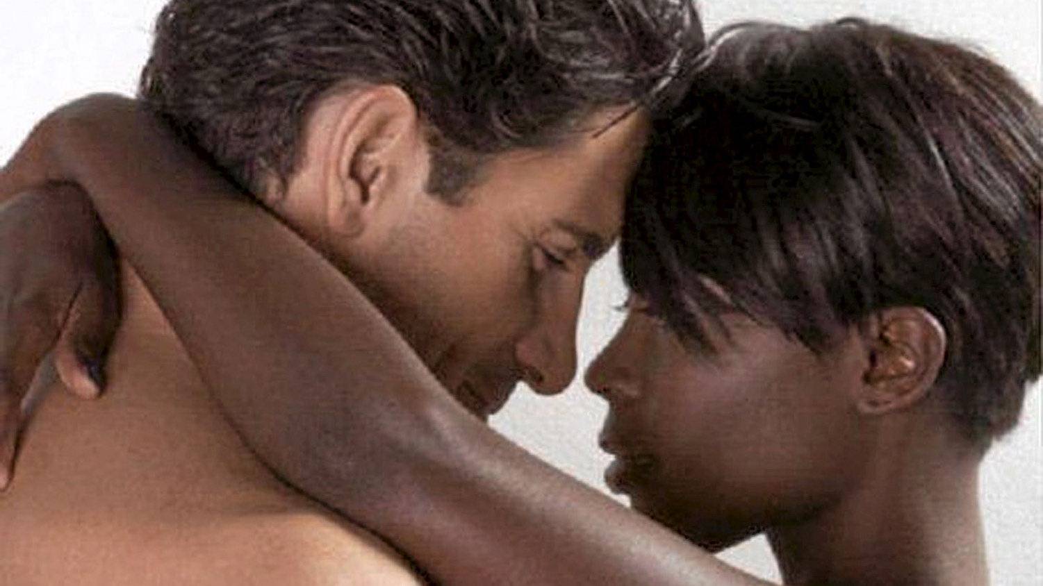 Sexy interracial poster sparks furor in South Africa picture pic