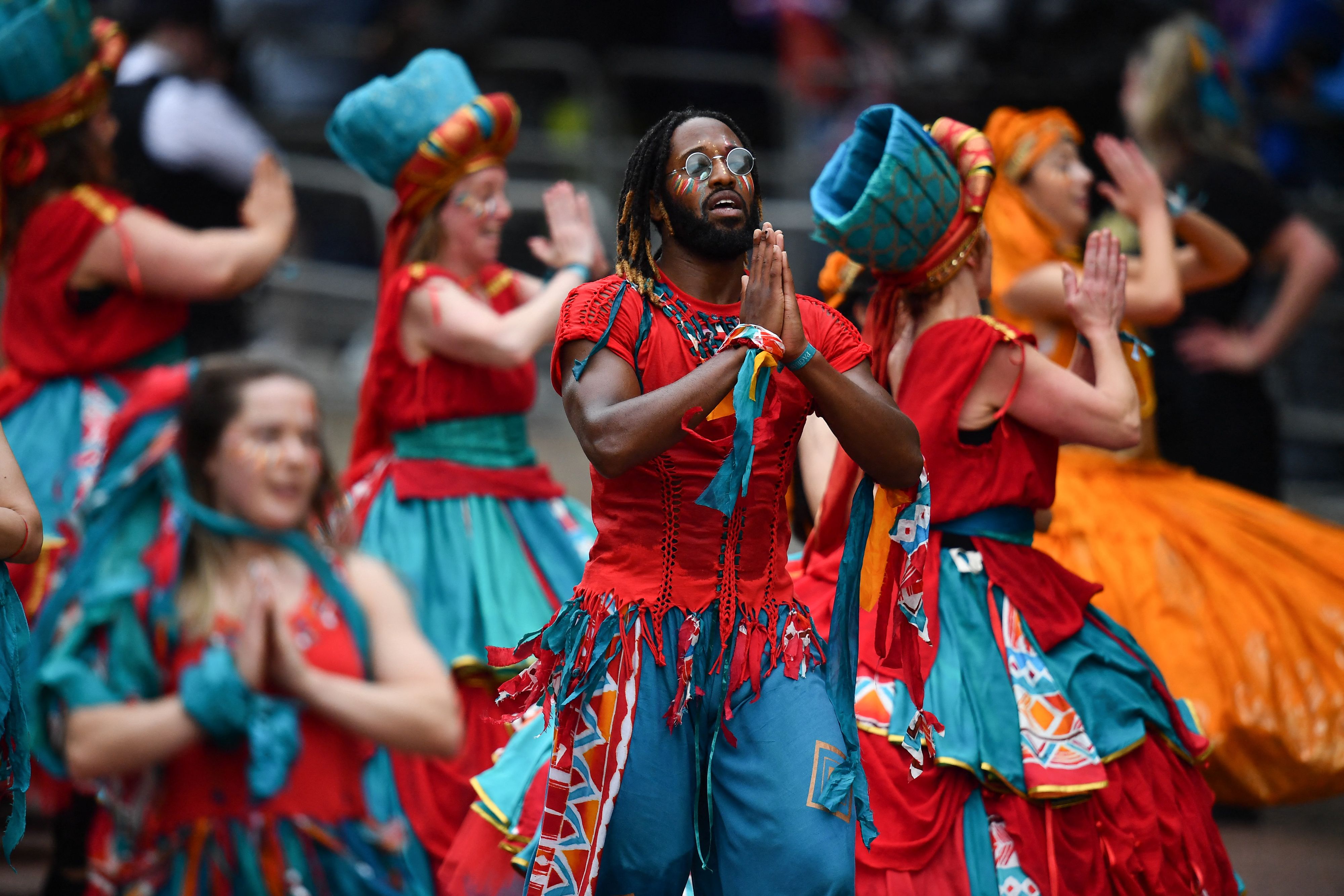 London UK, 5th June 2022. woman street dancer at The pageant for the Queen  Elizabeth II's Platinum Jubilee celebration in central London. Large Crowds  line the street along the Mall and Whitehall