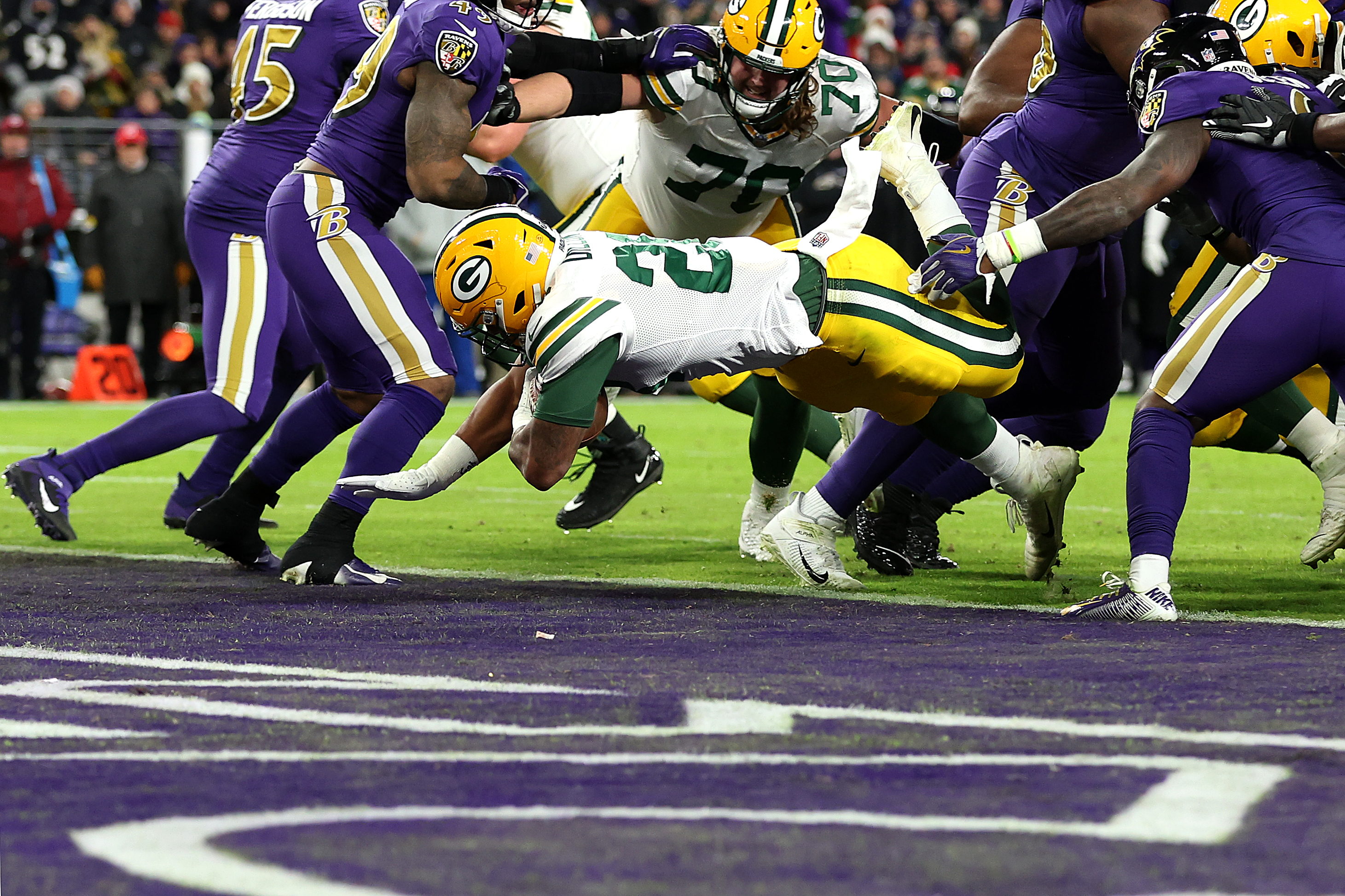 Green Bay, United States. 24th Jan, 2021. Tampa Bay Buccaneers quarterback  Tom Brady (12) hands off the ball during in the first half of the NFC  Championship against the Green Bay Packers