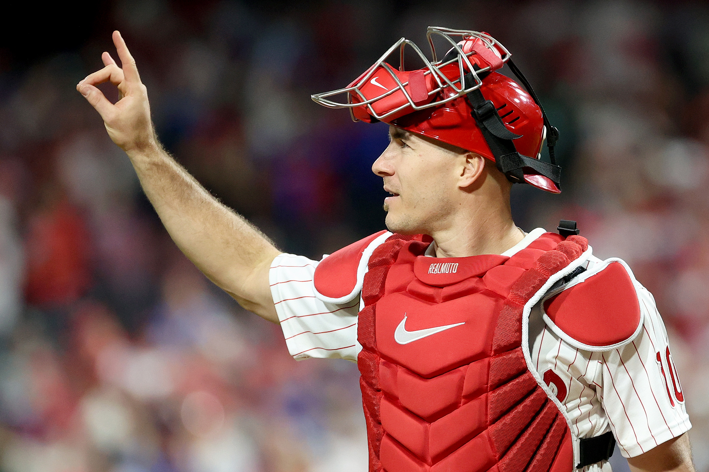 Spike This! Hoskins, Harper homer, Phils rout Braves in NLDS