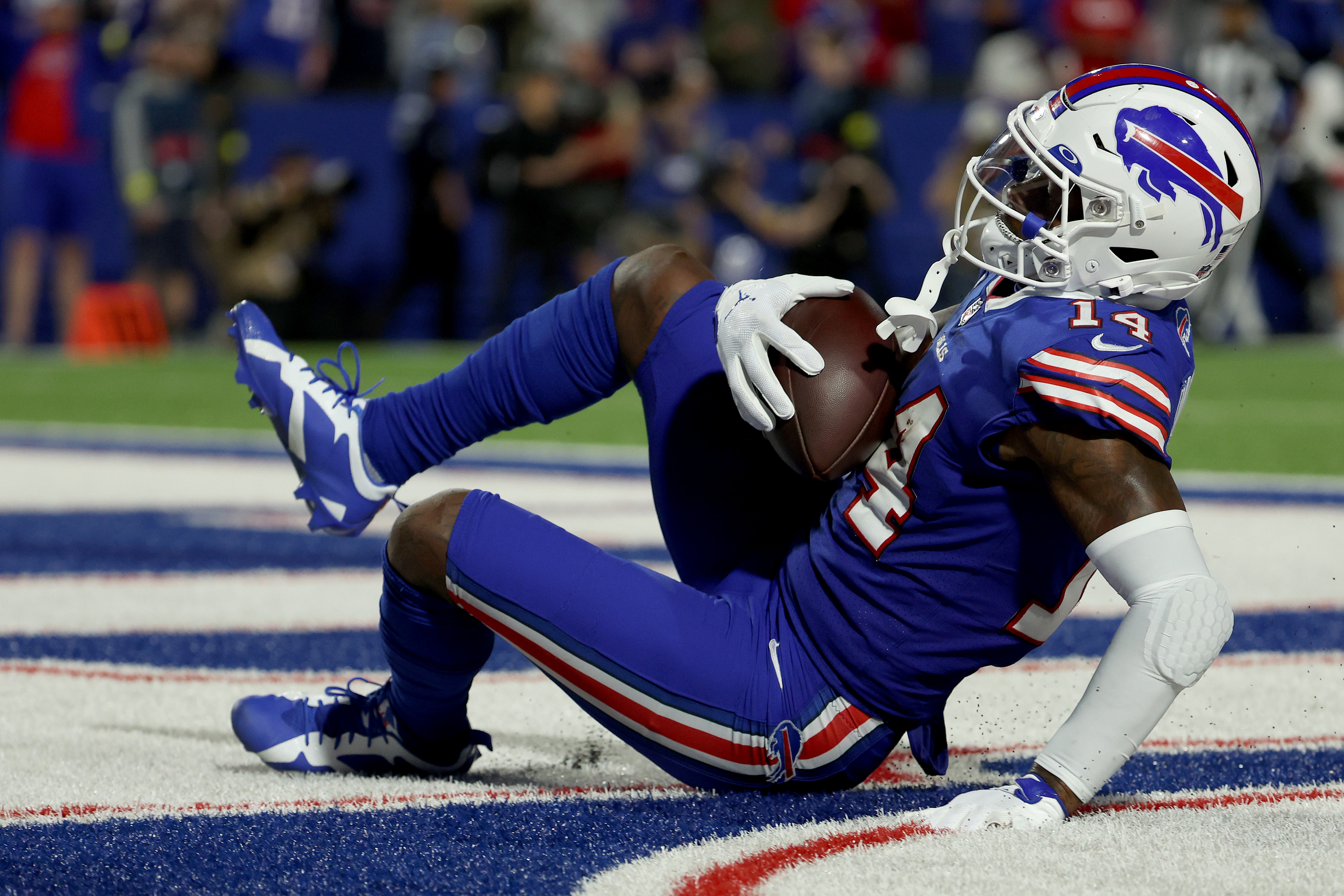 Diggs scores 3 TDs for Bills in 41-7 rout of Titans