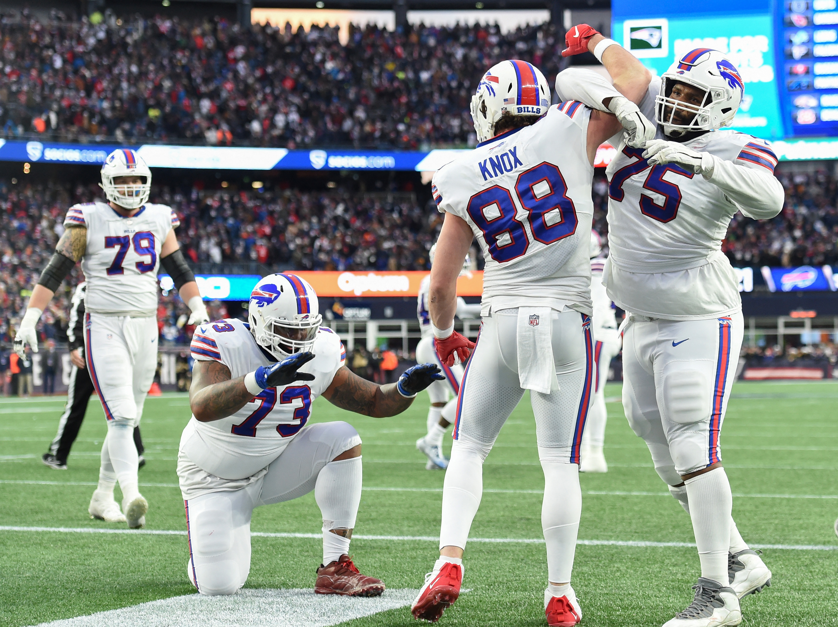 Buffalo Bills tight end Dawson Knox (88) scores a touchdown against New  England Patriots safety …
