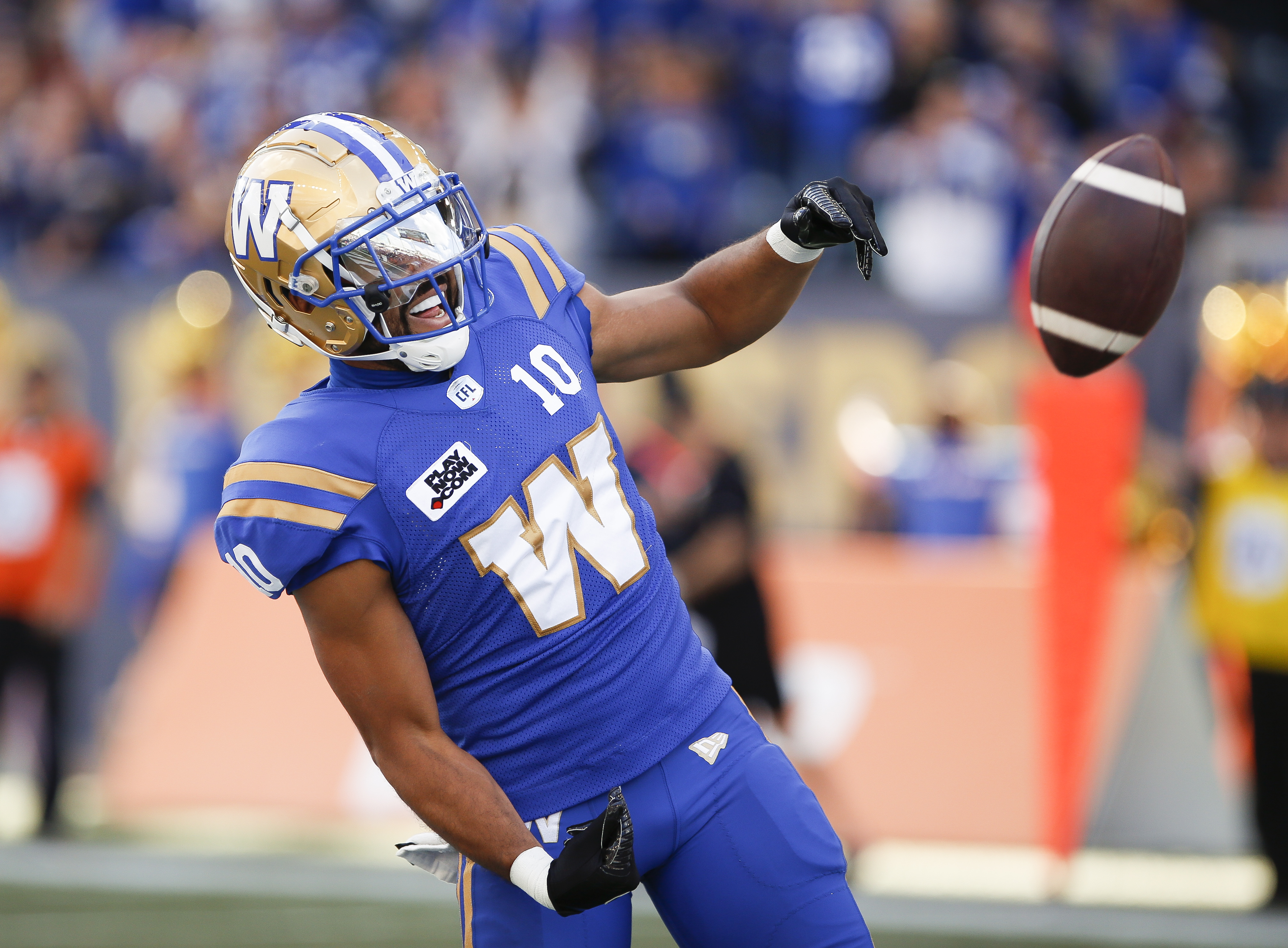 Winnipeg Blue Bombers' Greg McCrae (29) and Brady Oliveira (20) celebrate  Oliveira‚Äôs touchdown against the Edmonton Elks during first half CFL  action in Winnipeg on October 8, 2022. Oliveira will make his