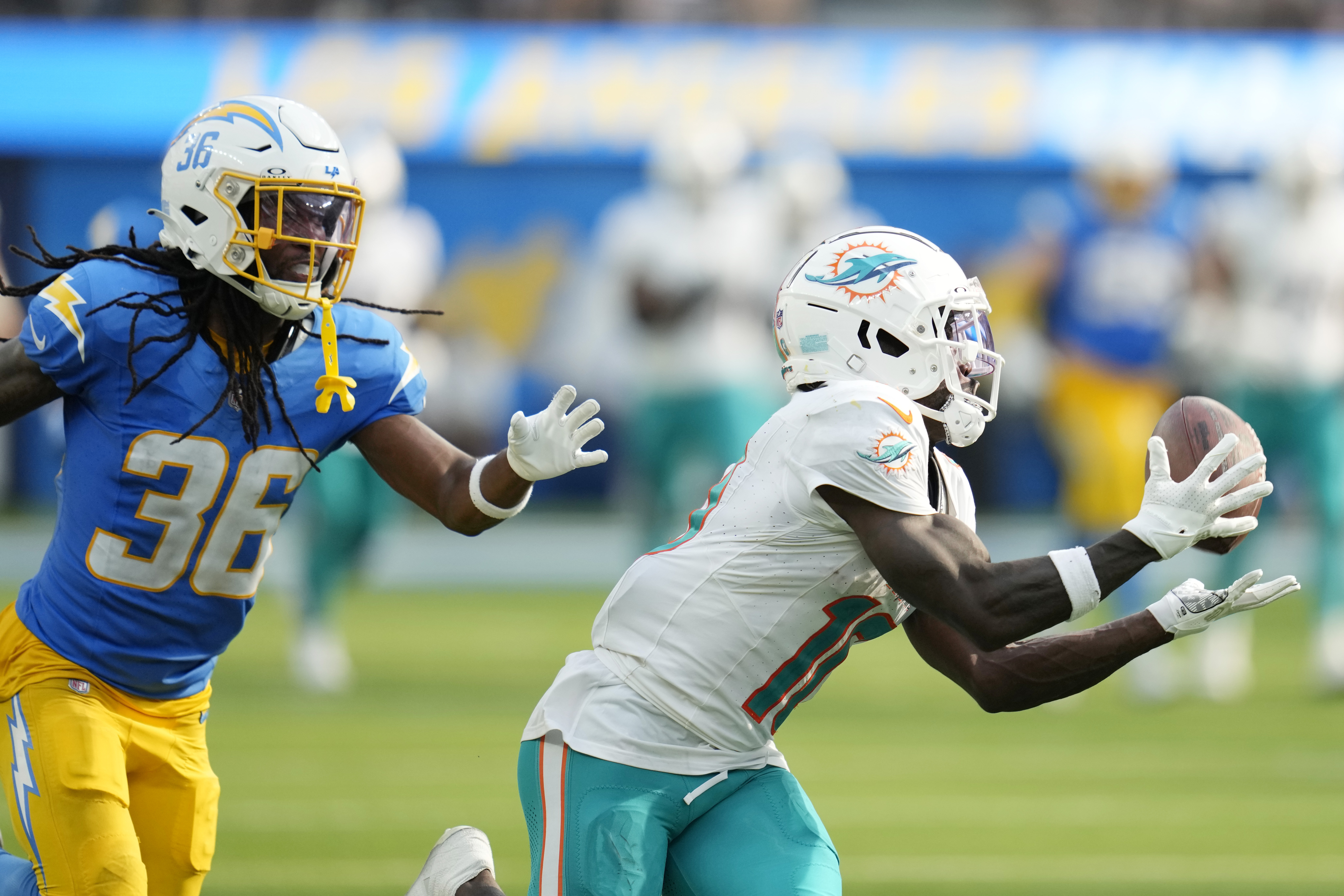 Hill, Tagovailoa too much for Chargers as Dolphins open with 36-34
