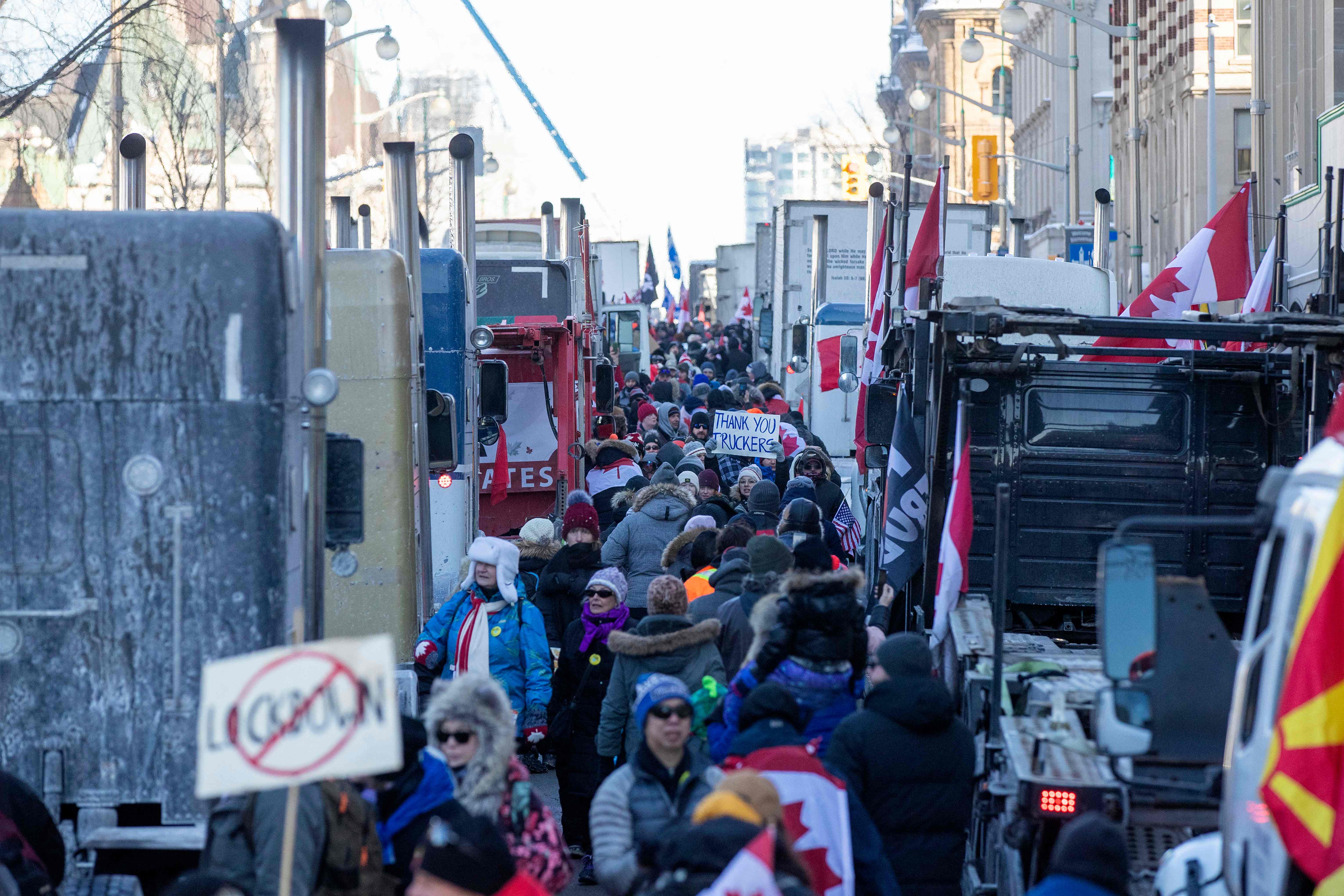 In photos: Trucker convoy converges on Ottawa on Saturday - The Globe ...