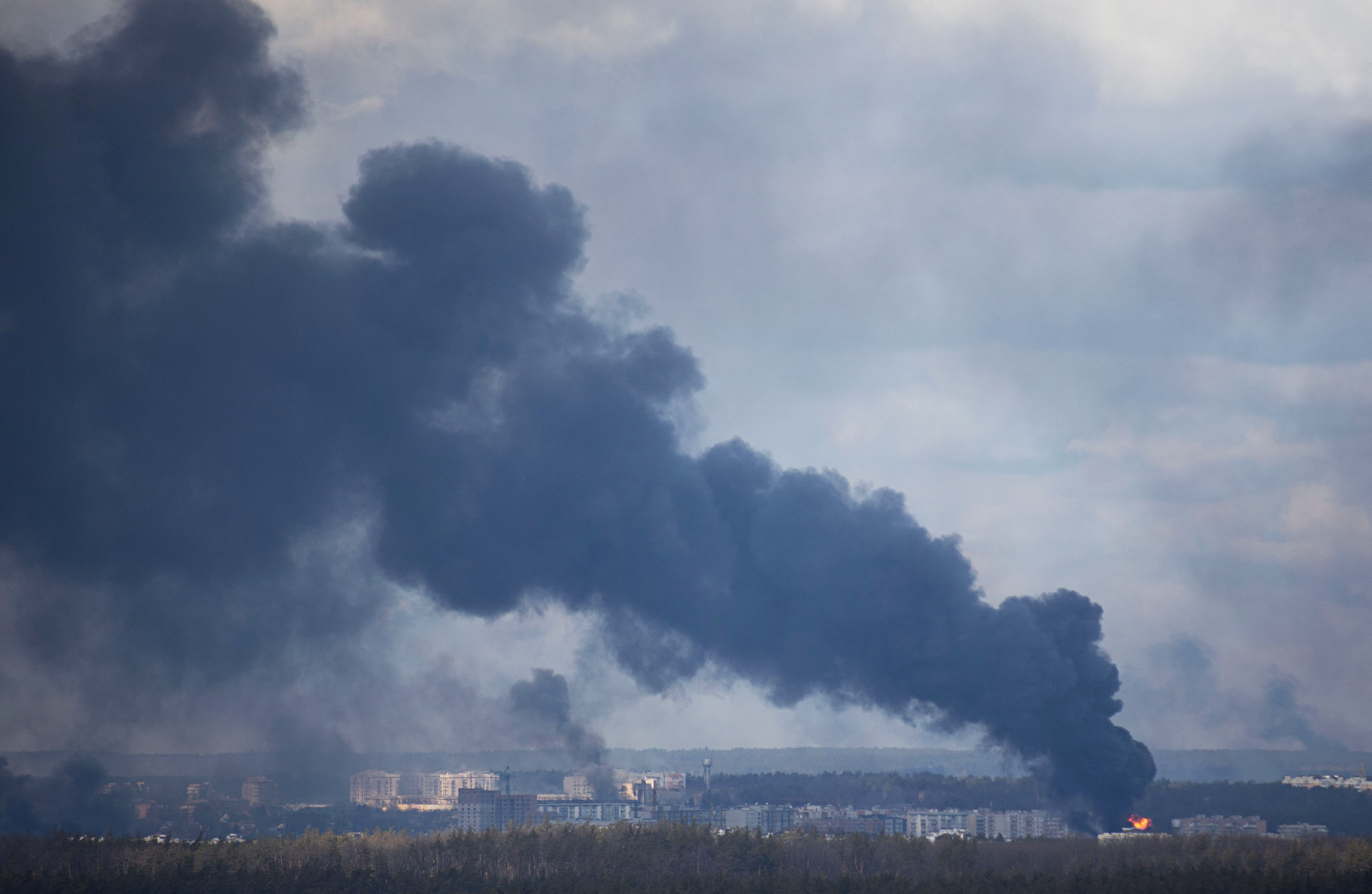 In photos: Kyiv holds defence and Russian troops advance throughout ...