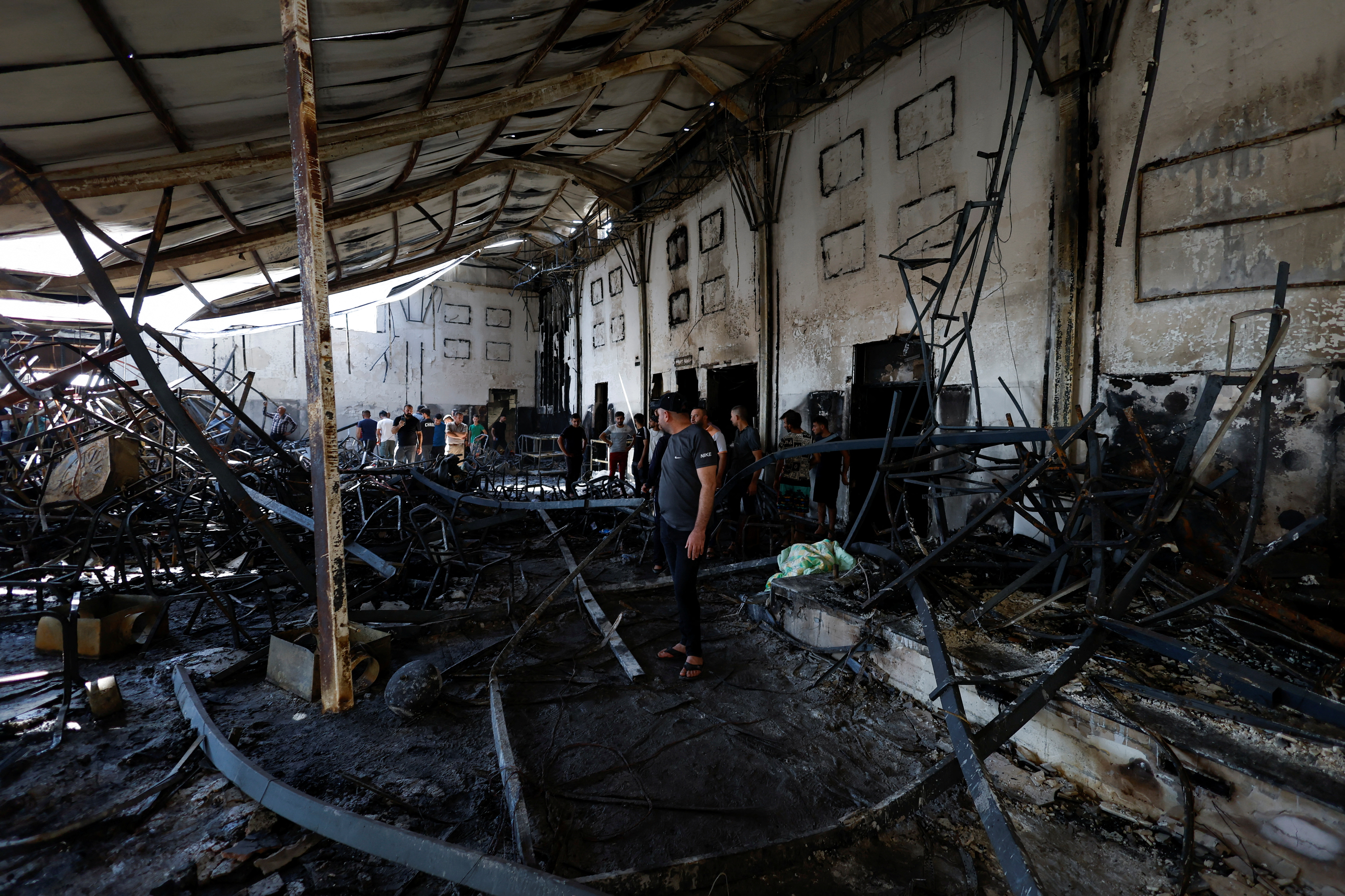 Fire rips through Iraqi wedding hall, killing around 100 in shock to  Christian community
