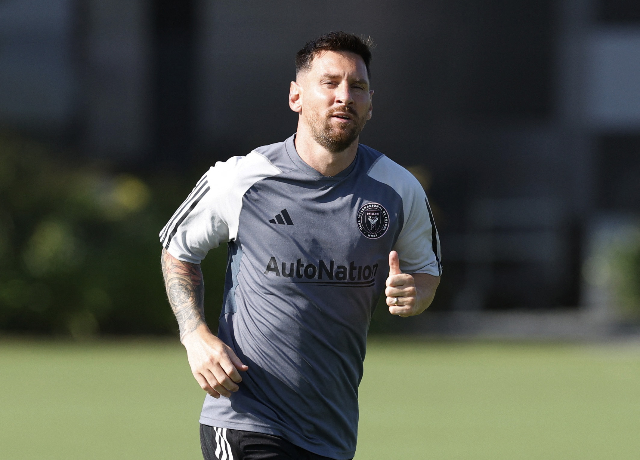 Lionel Messi takes to the practice field for first time since