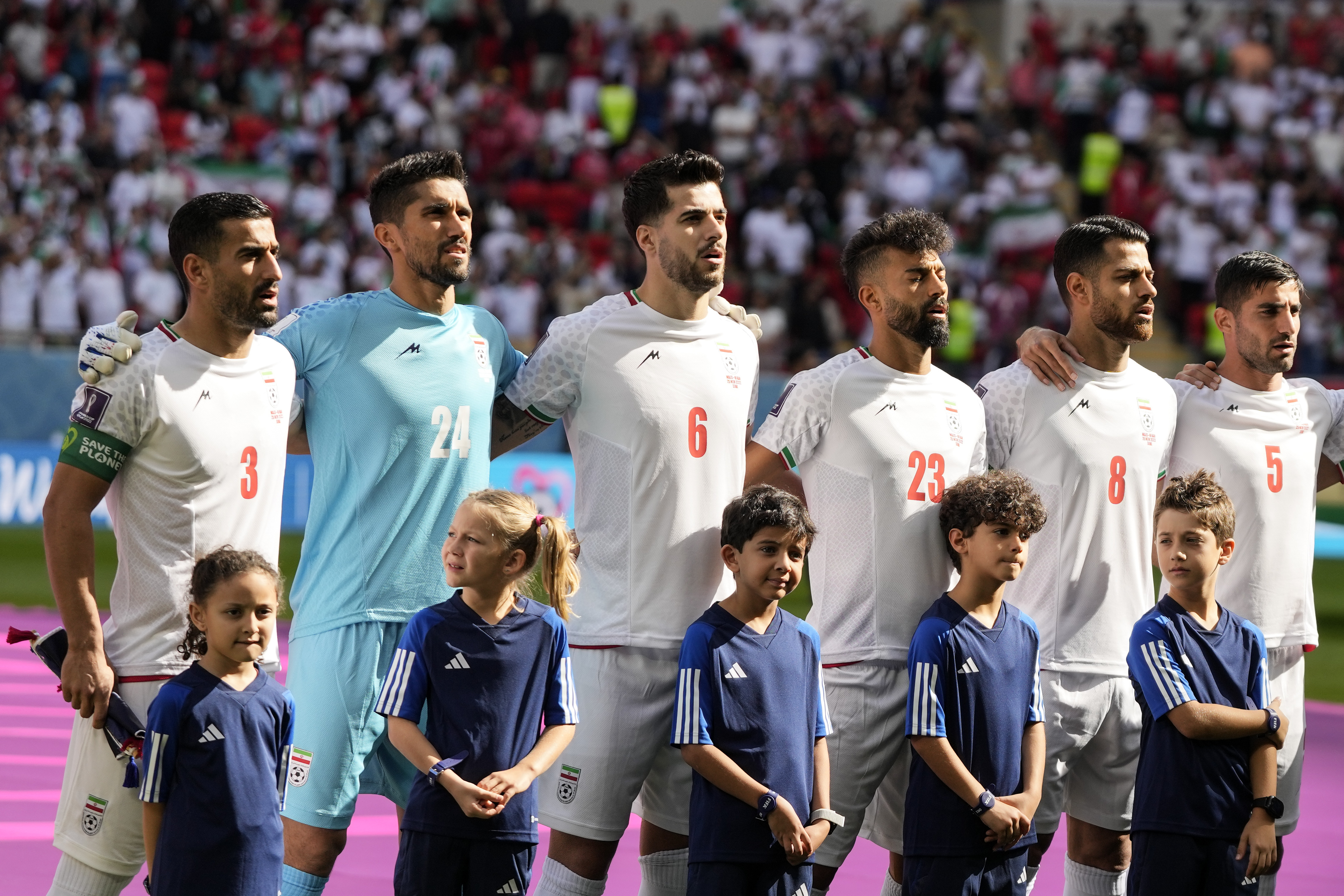 Irans World Cup team mouths along to national anthem ahead of Wales match 
