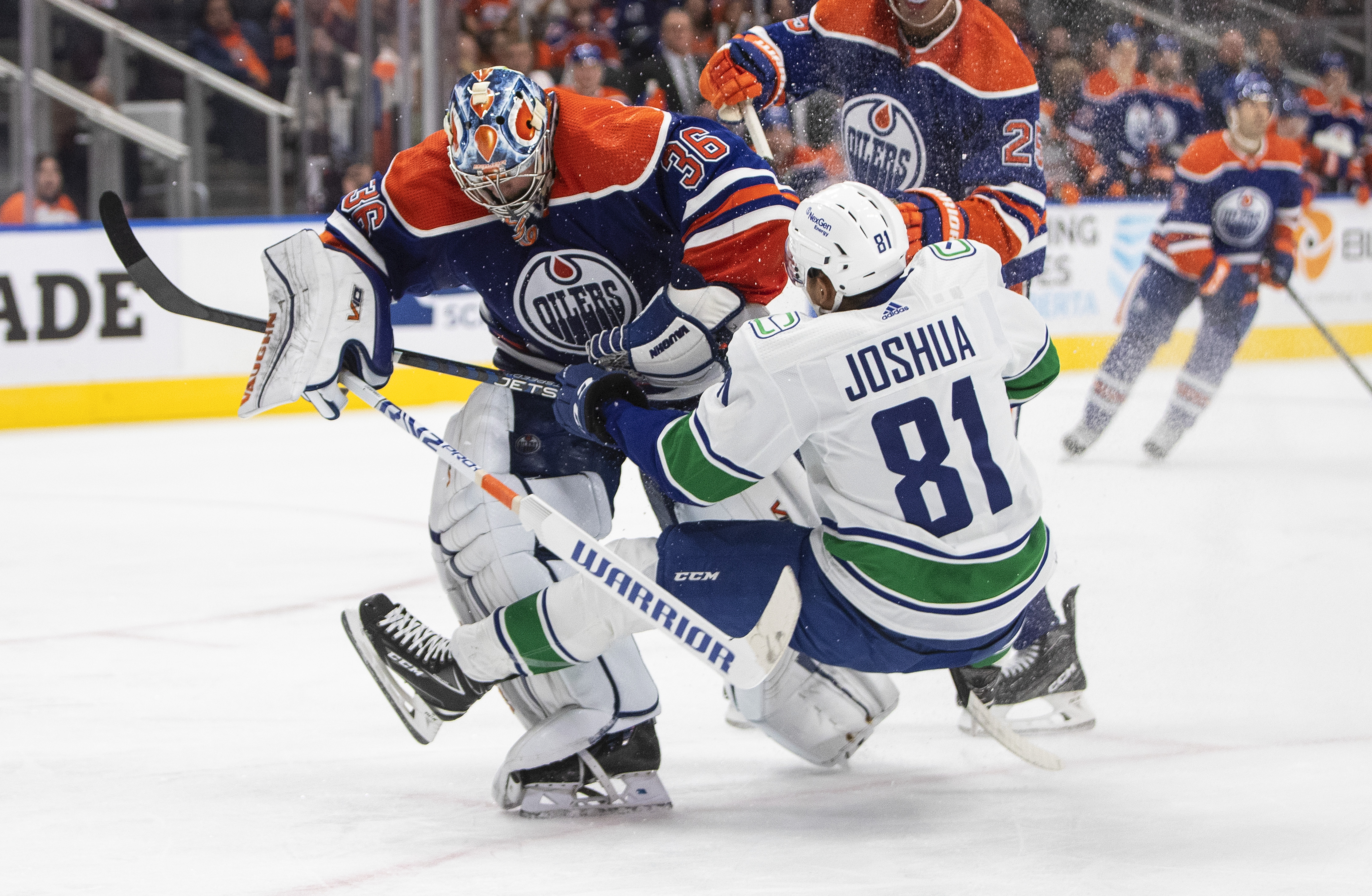 Oilers lose to Canucks in NHL opener