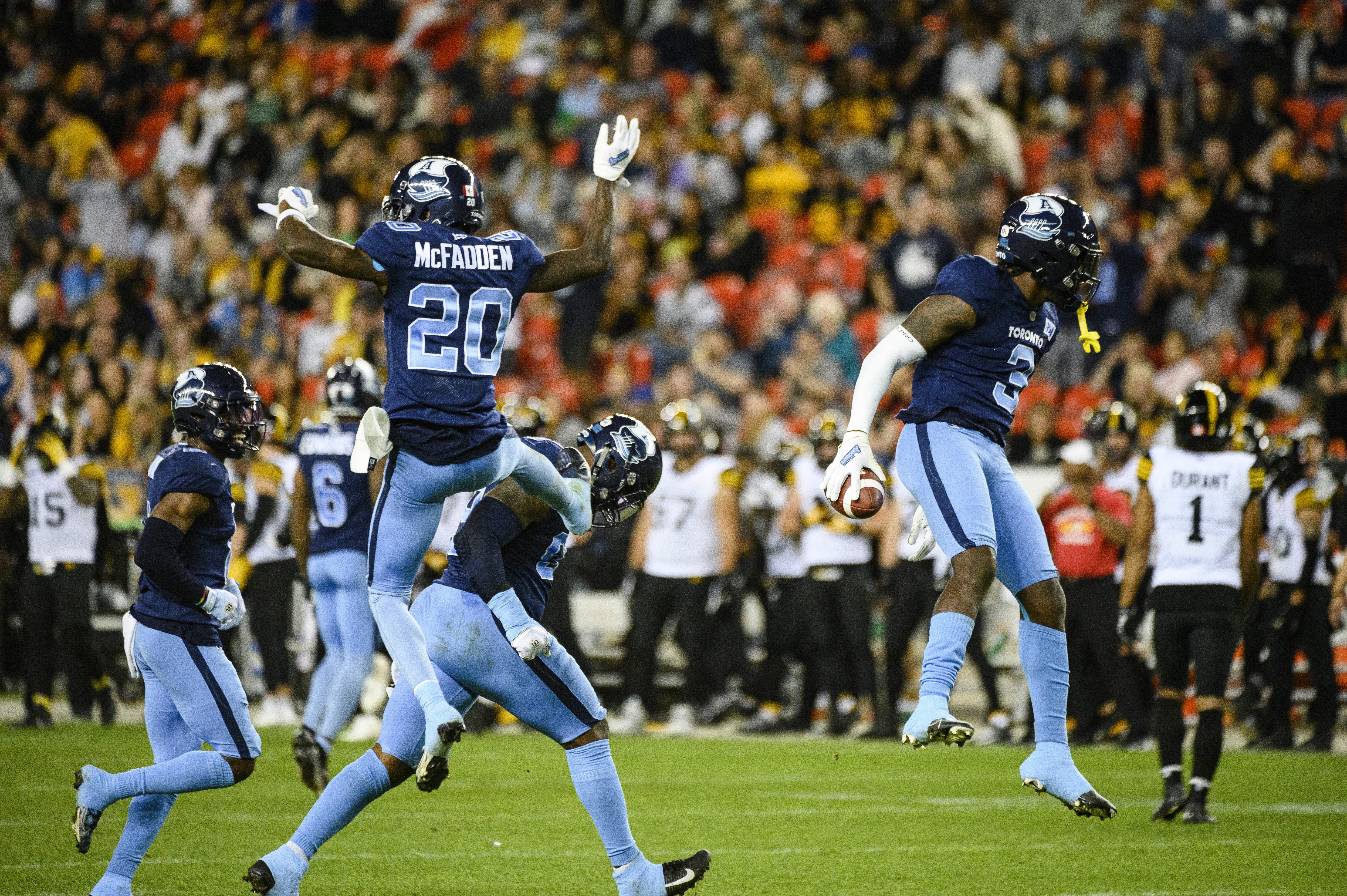 Toronto Argonauts linebacker Henoc Muamba (10) celebrates after making a  tackle against the Montreal Alouettes during the first half of a CFL  Eastern Final football game in Toronto on Sunday, Nov. 13