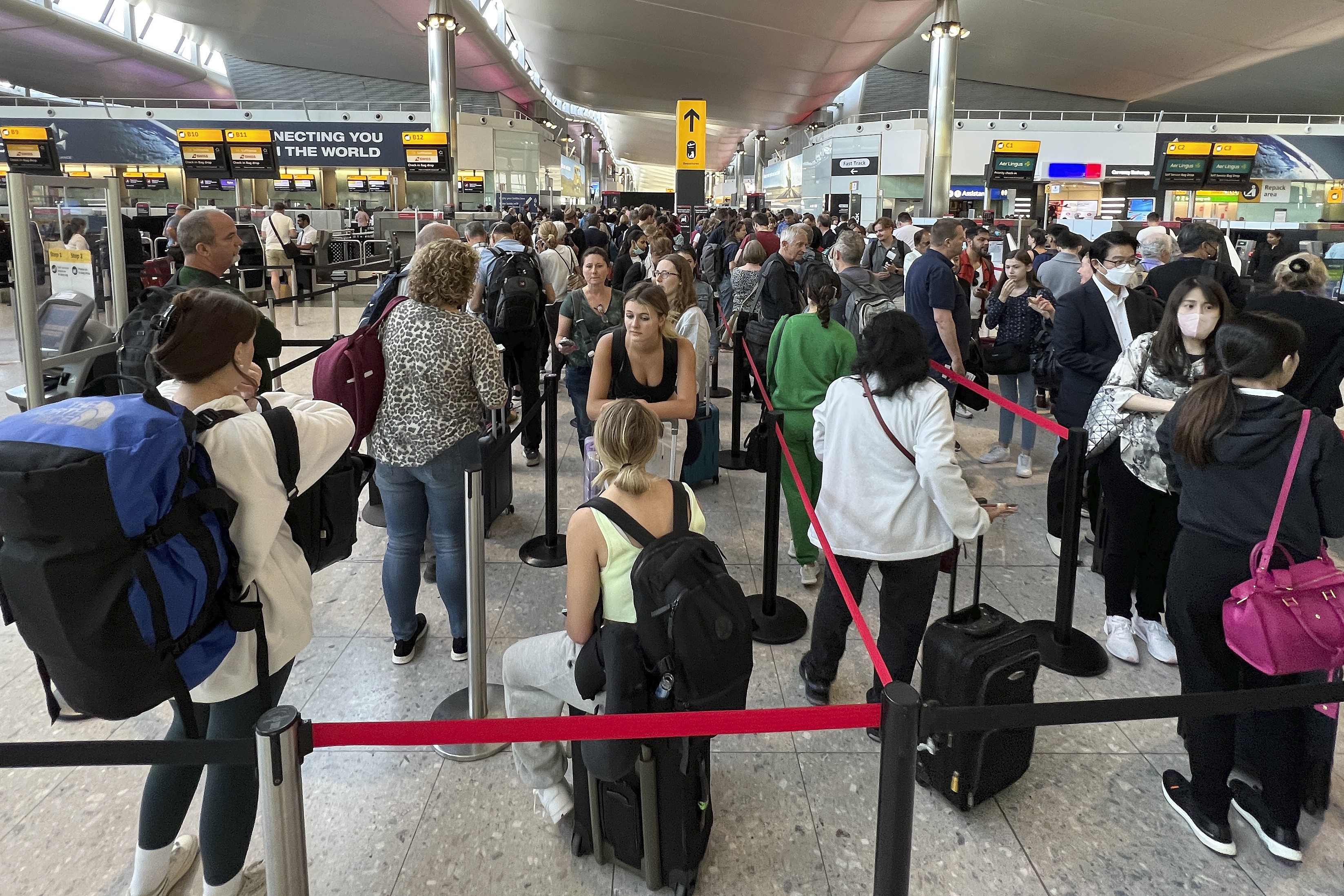 London's Heathrow airport caps departing passengers at 100,000 a day