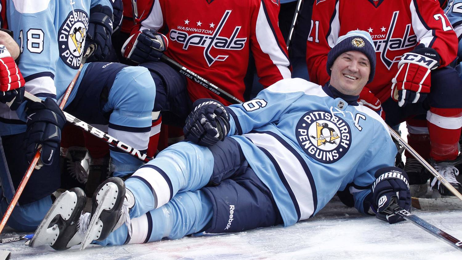 Mario Lemieux of the Pittsburgh Penguins skates with the puck as