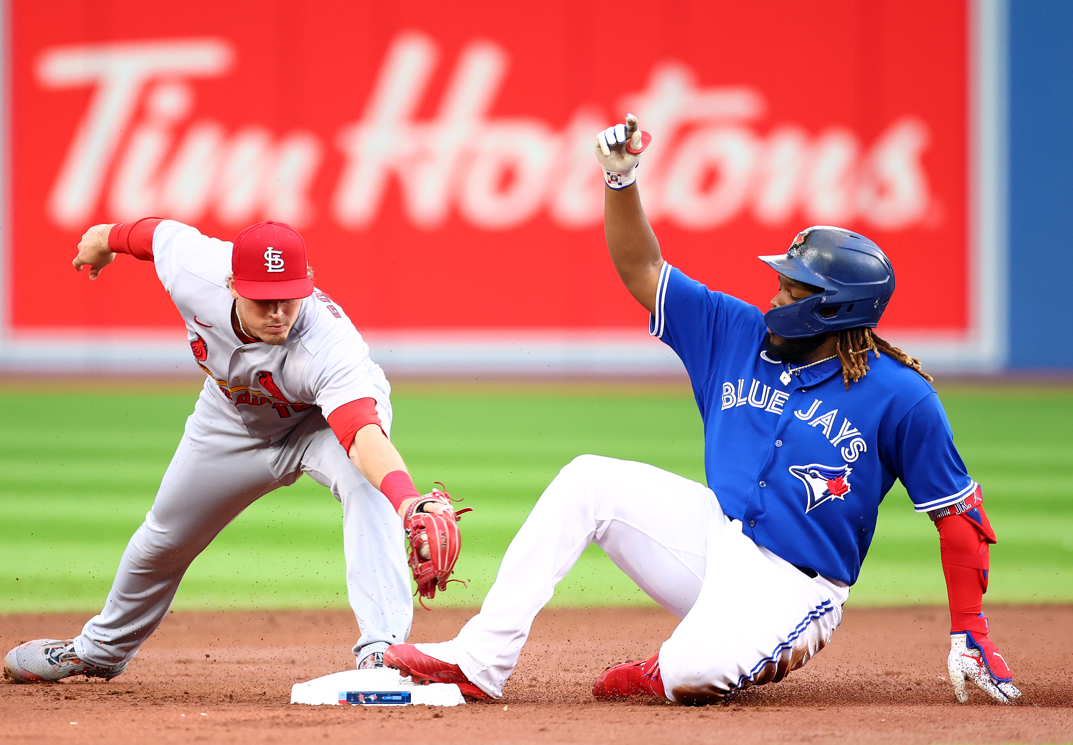 Pujols hits 3-run homer as Cardinals beat Blue Jays 6-1