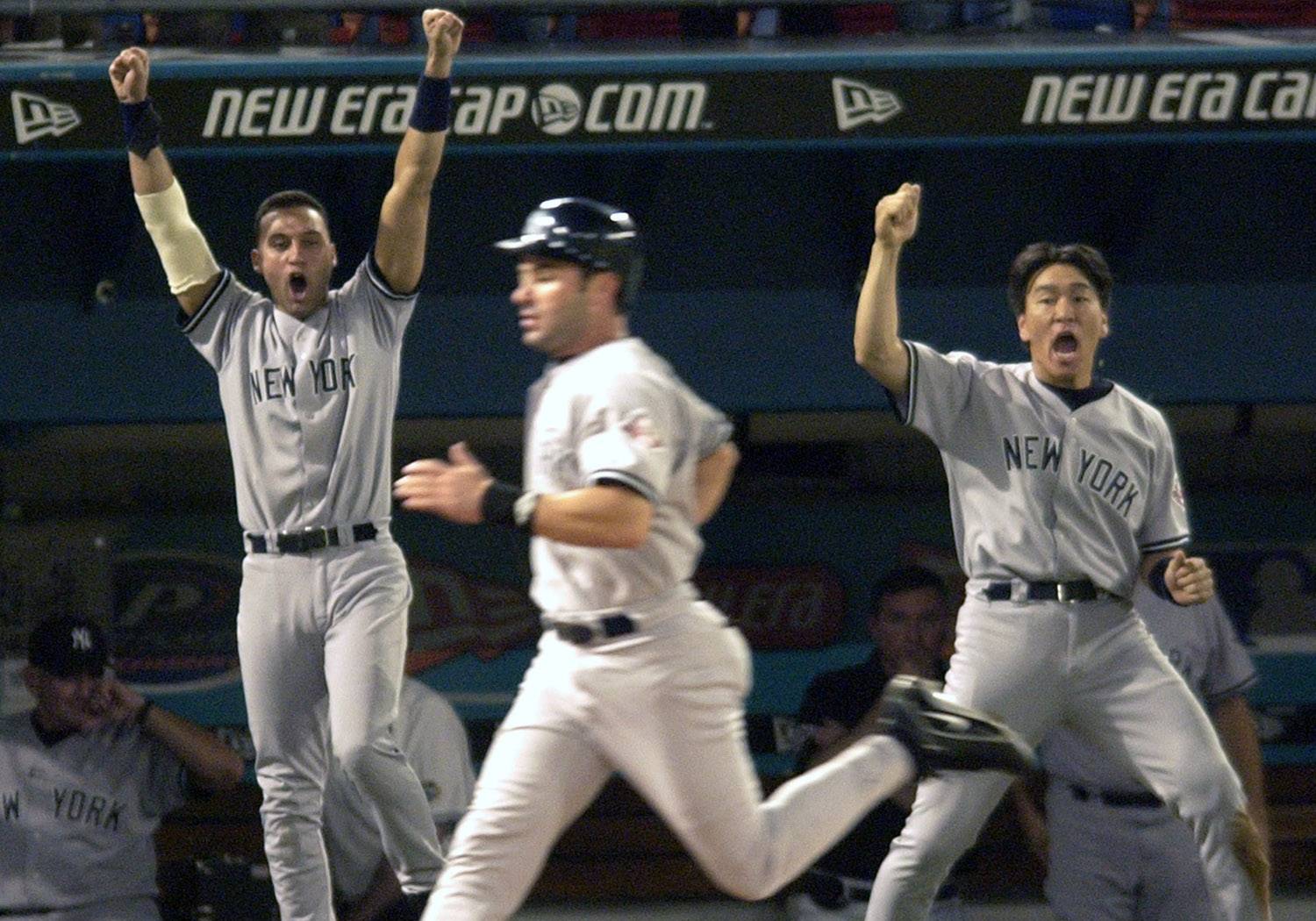 New York Yankees' Hideki Matsui, left, Ruben Sierra, center, and