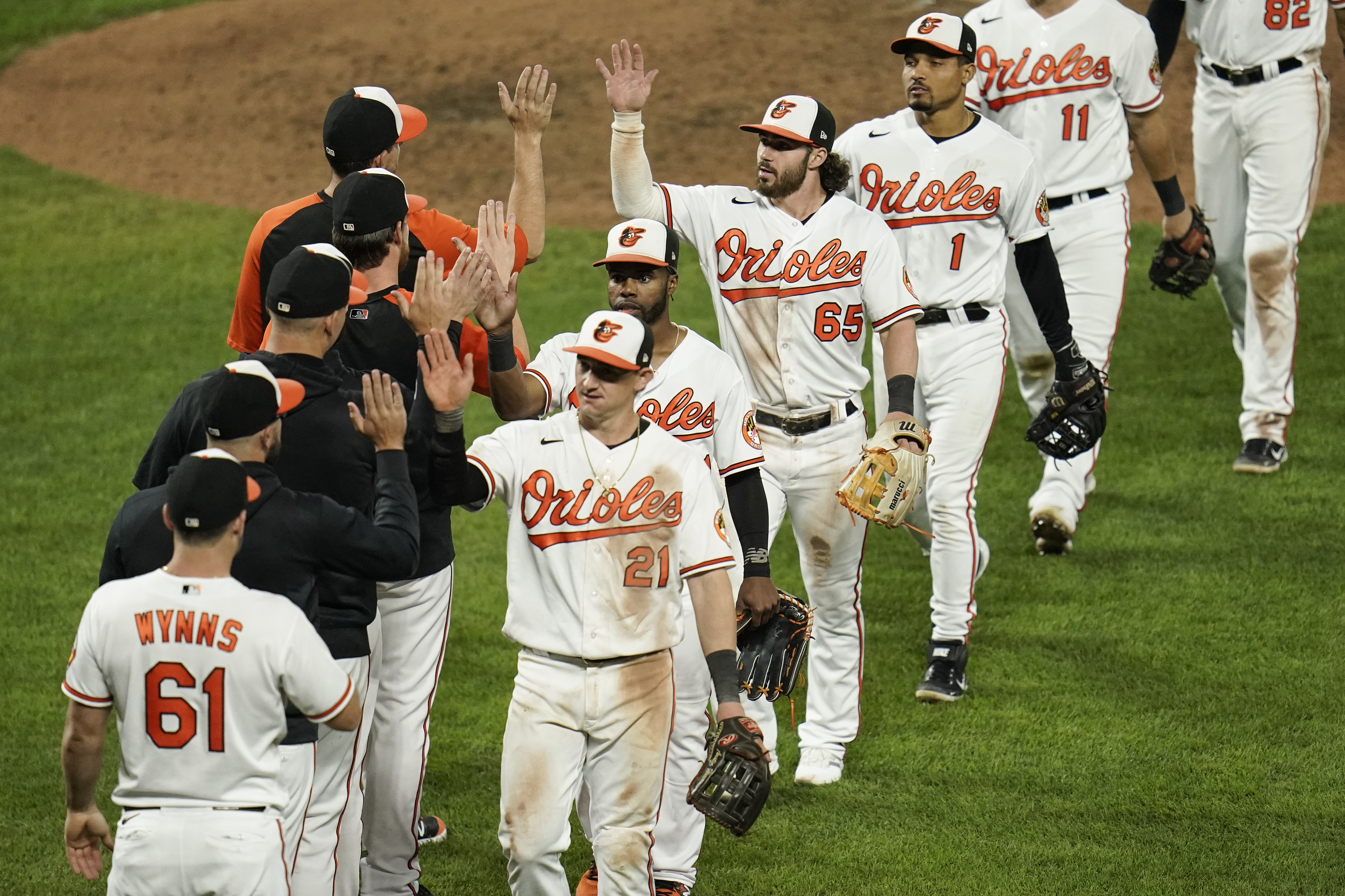 Blue Jays fend off late charge from Orioles to keep playoff hopes