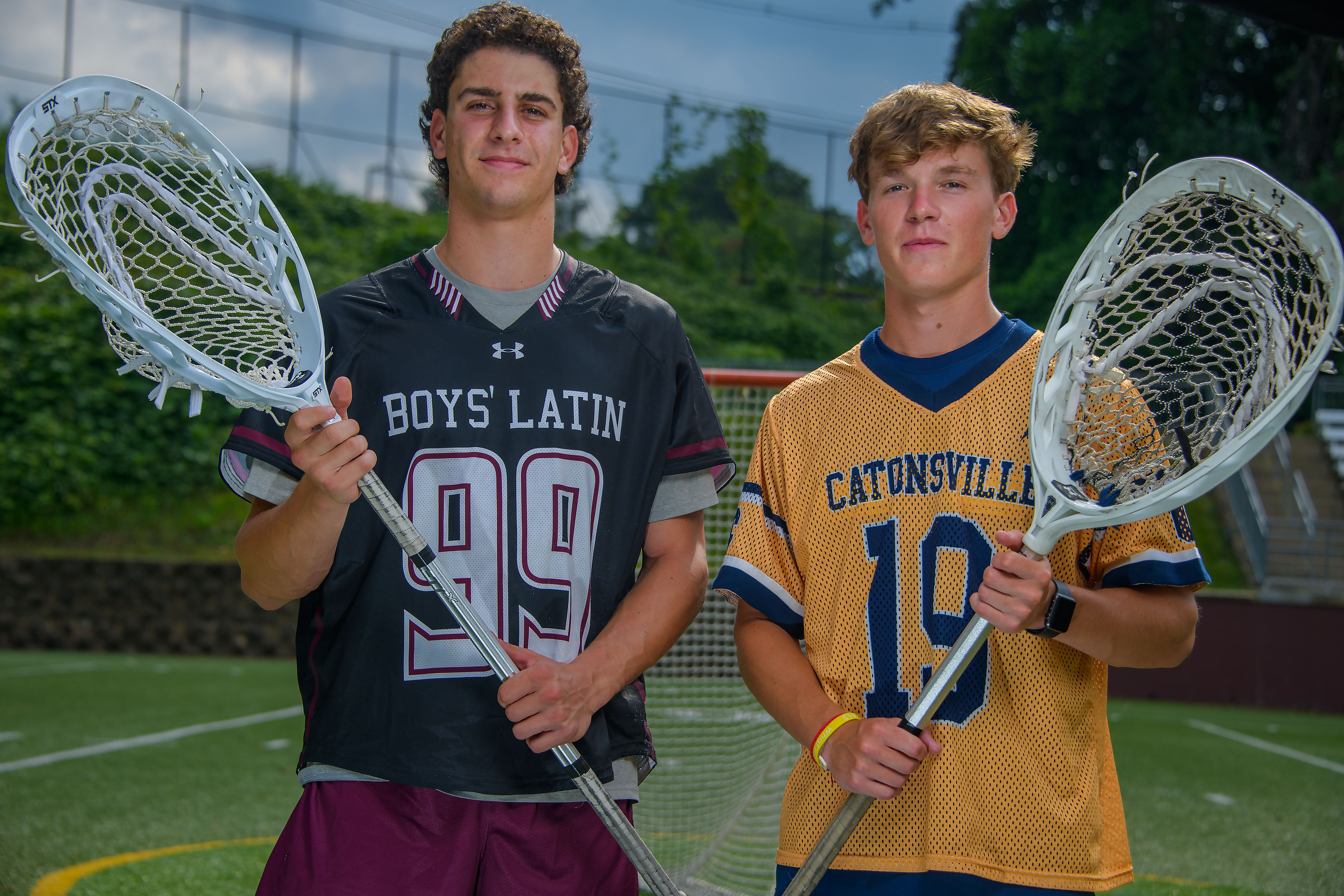 At the Armour All-America Lacrosse Game, goals are bountiful. Catonsville's Brian and Boys' Latin's Cardin Stoller try to stop them.