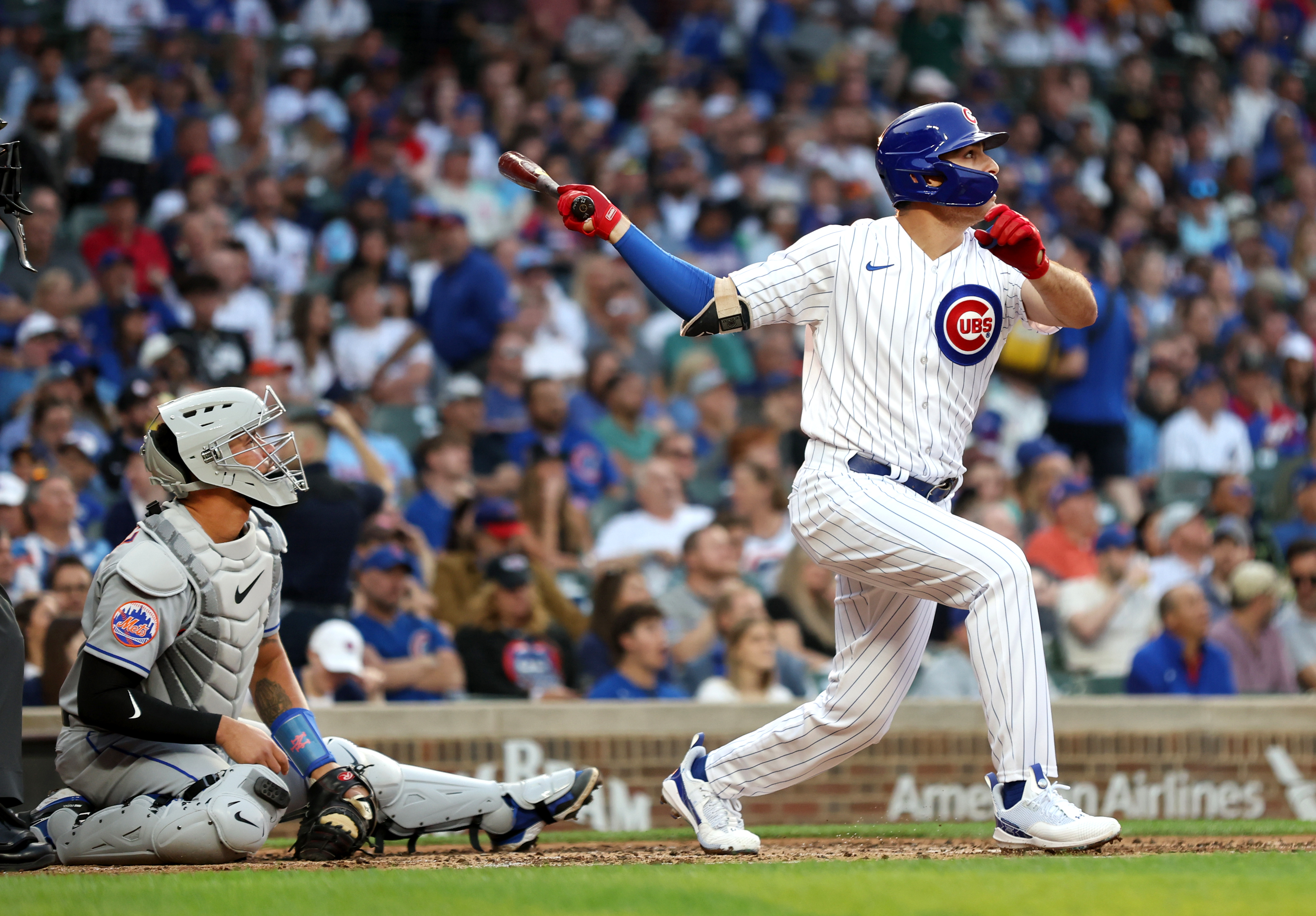 Chicago, US, May 23, 2023. Seiya Suzuki of the Chicago Cubs rounds the  bases after hitting a solo home run in the second inning of a baseball game  against the New York