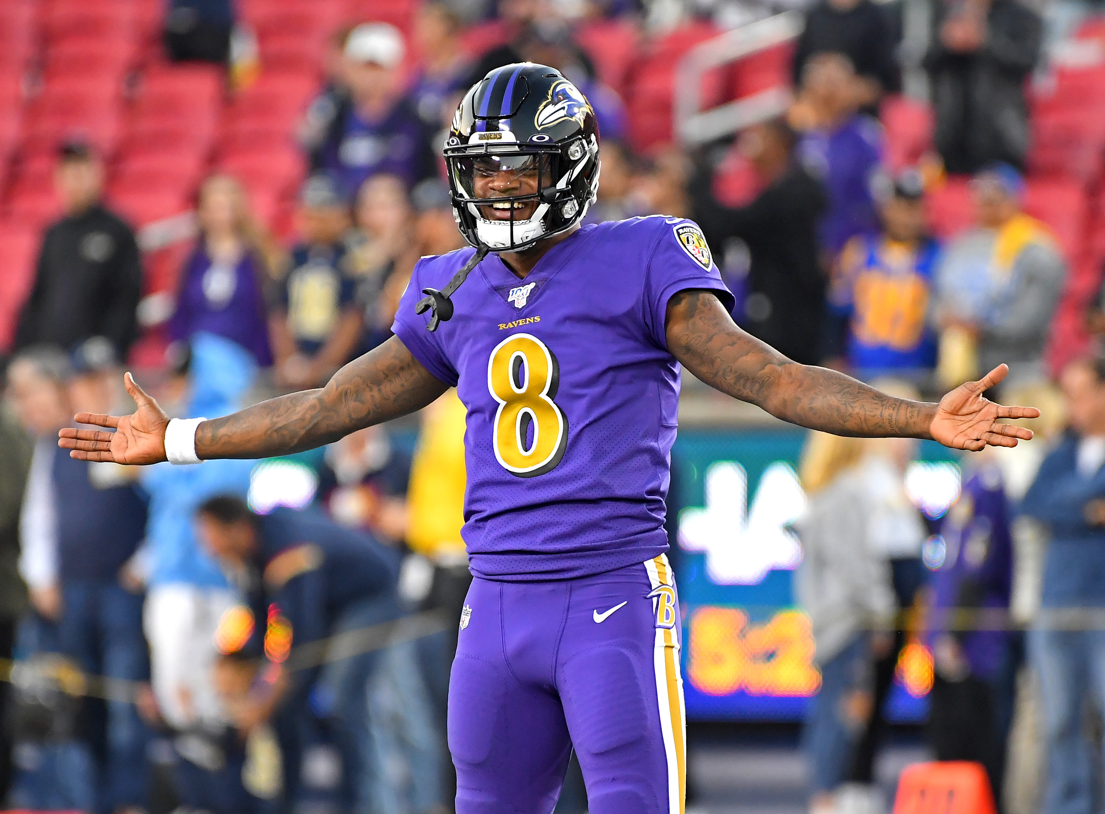 Lamar Jackson Baltimore Ravens Fanatics Authentic Unsigned Purple Jersey  Scrambling Photograph