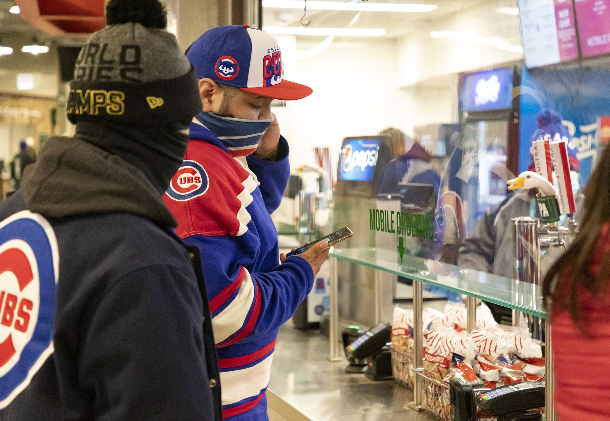 At Wrigley Field, online food ordering clashes with stubborn ballpark conventions and traditions