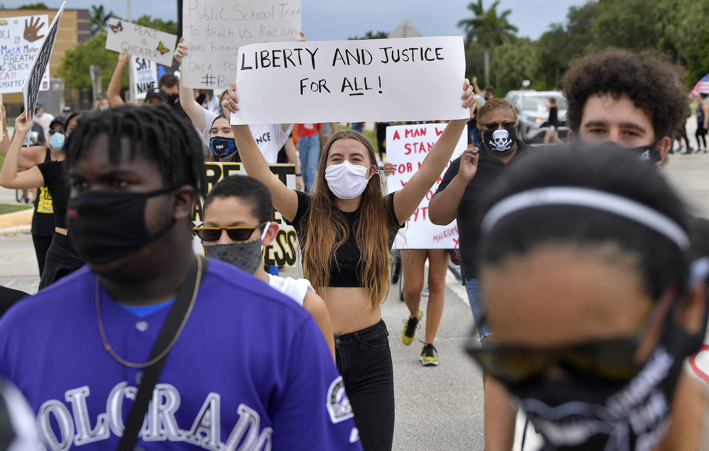 Black Lives Matter And Back The Blue Protesters Rally In