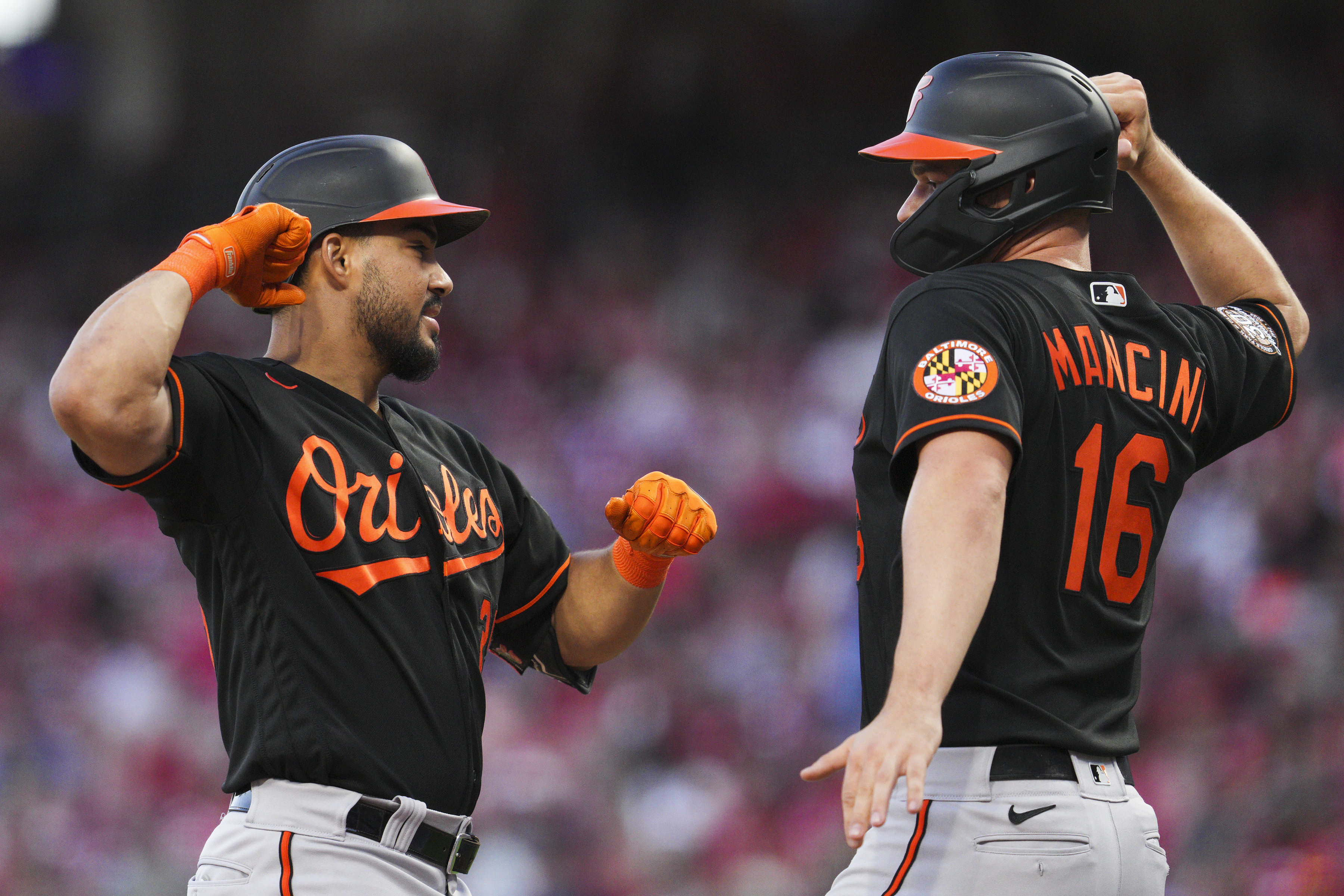 Orioles score 4 in 9th to beat Reds, 6-2, remain above .500 at 100