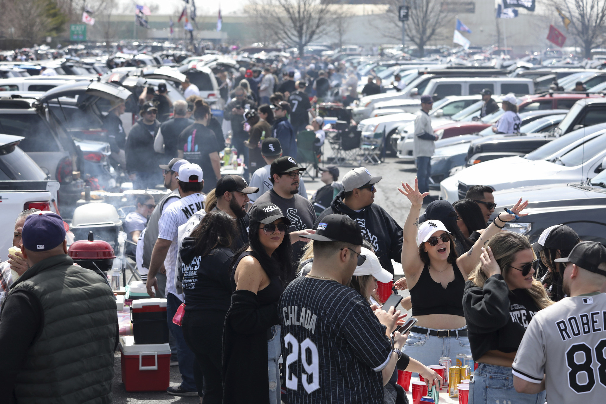Baseball fans tailgate and smile in the sun at White Sox home opener - CBS  Chicago