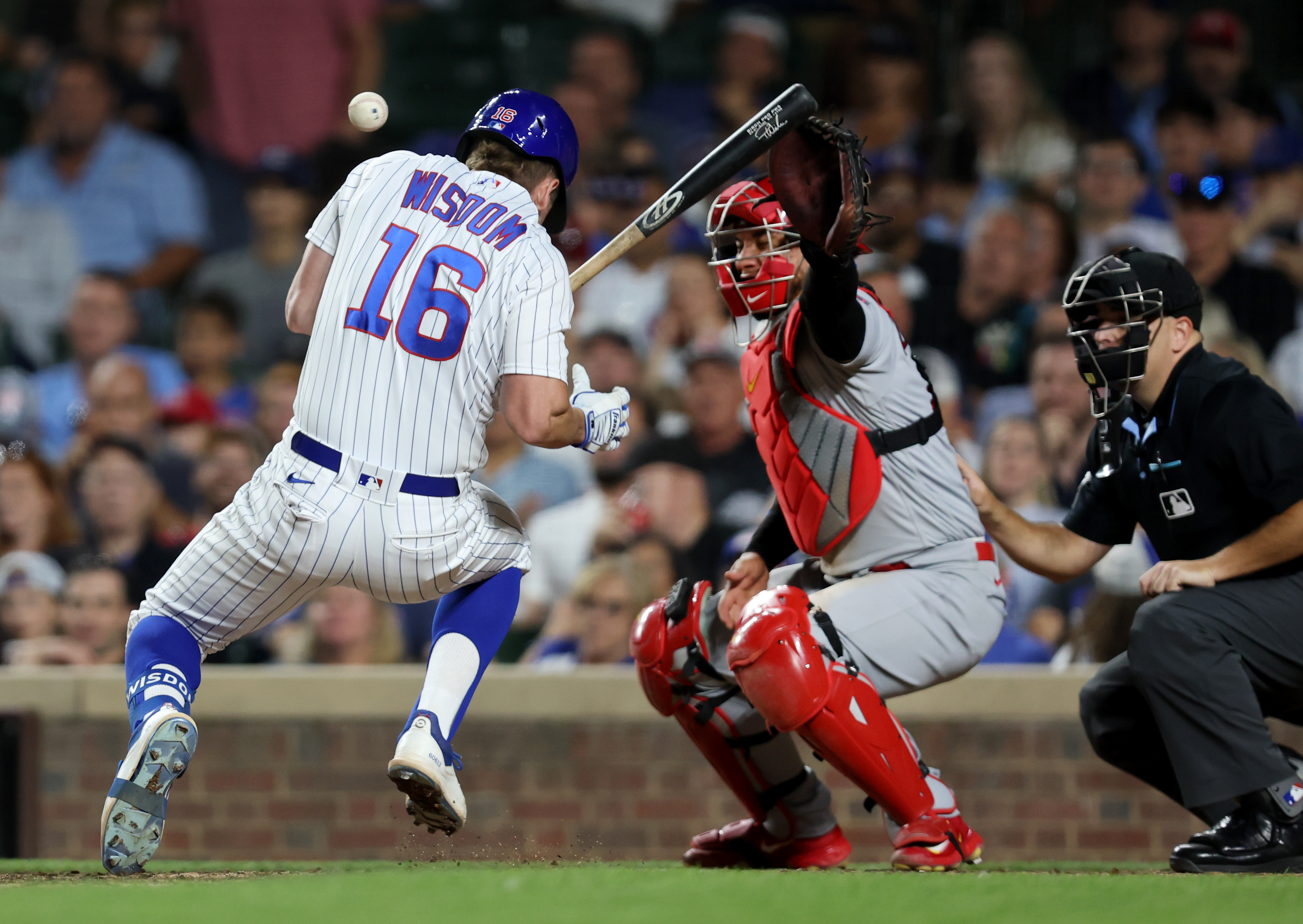Patrick Wisdom Chicago Cubs Unsigned Hits A Three Run Home Photograph