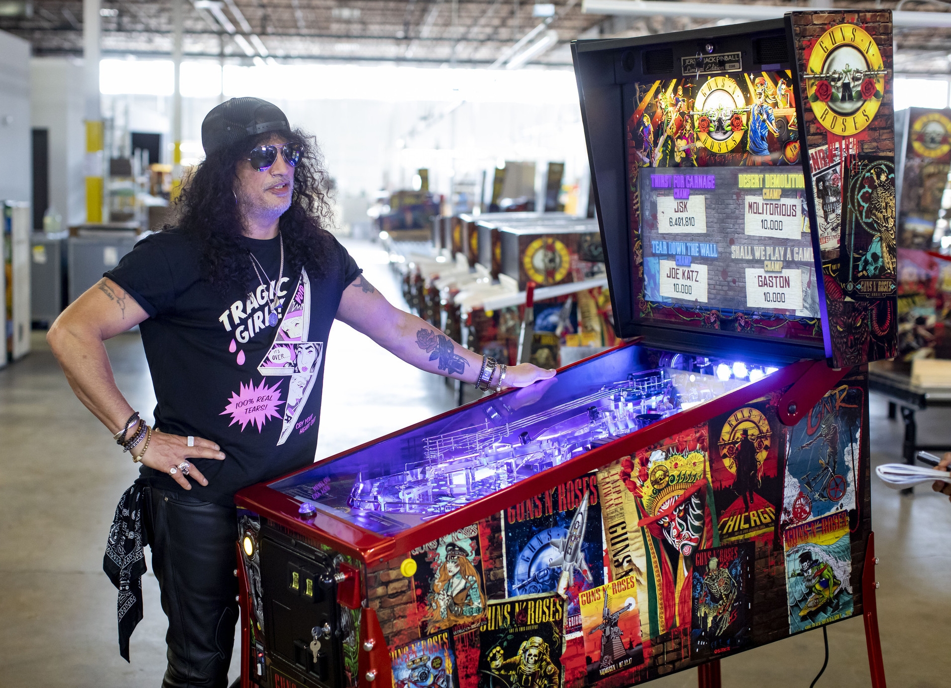 Why Guns N' Roses' is in Elk Grove Village, playing pinball – Chicago Tribune