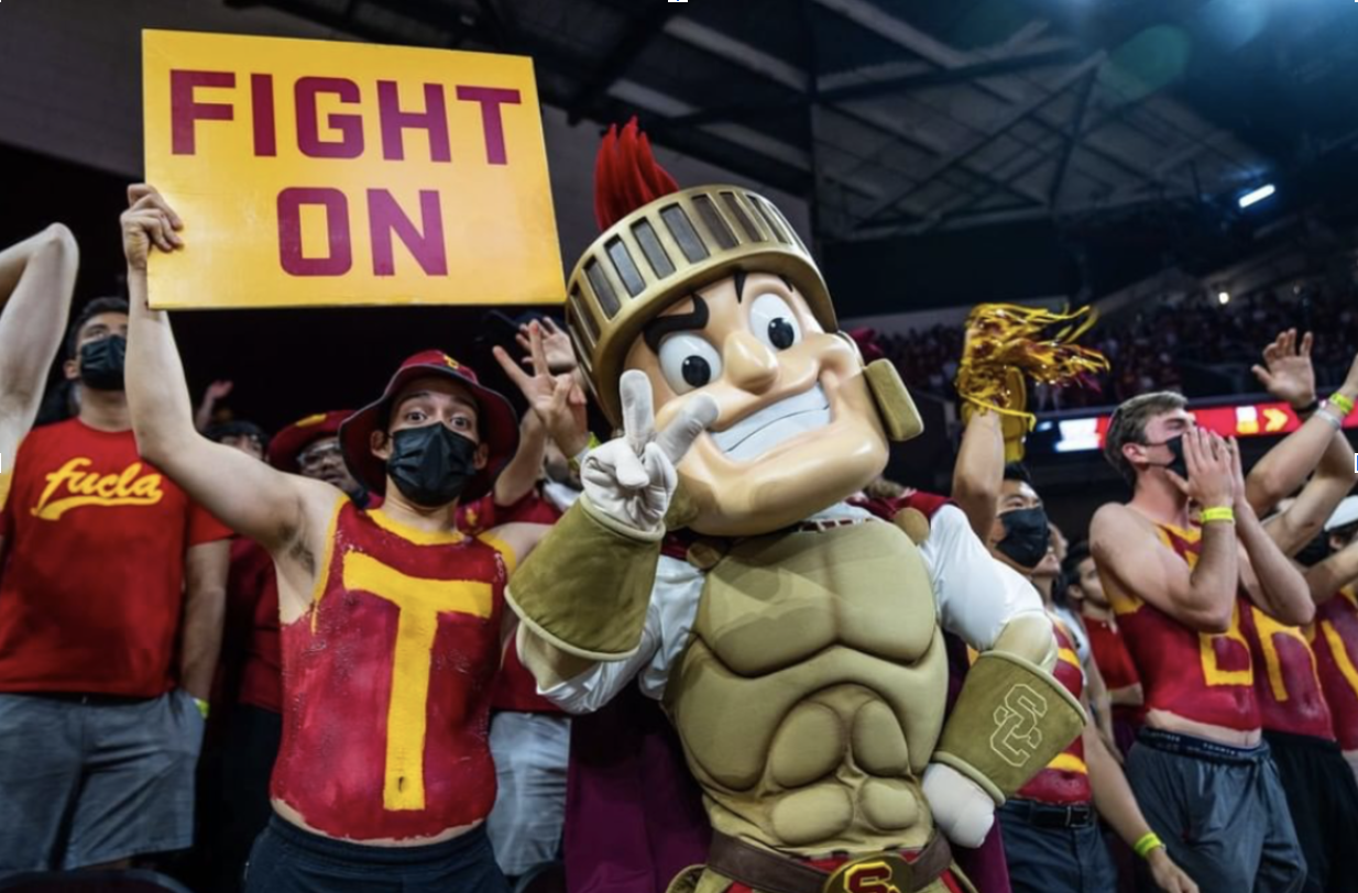 Sparky the mascot of the Los Angeles Sparks interacts with fans