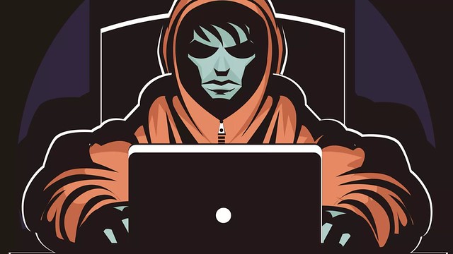 Digital illustration of a hacker in a puffy jacket using a laptop. Art courtesy of delcarmat.