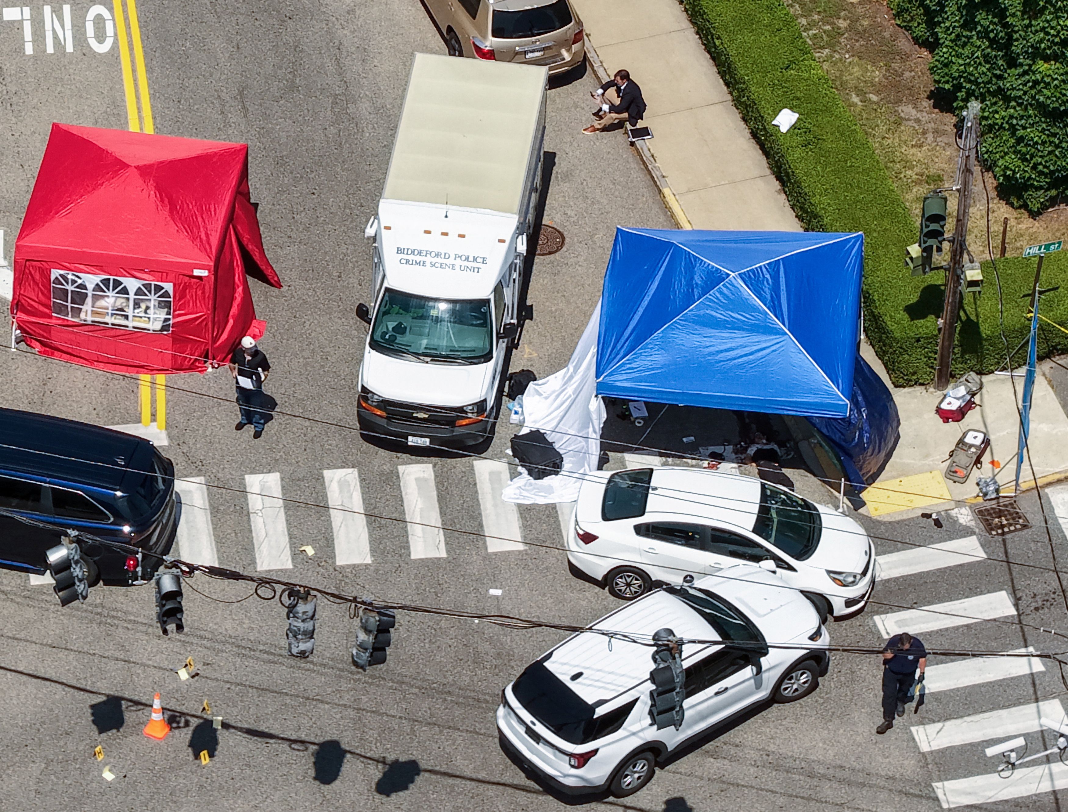 A drone view shows the aftermath of a shooting involving a U.S. Immigration and Customs Enforcement officer in Biddeford, Maine, on July 13. (CJ Gunther/Reuters)