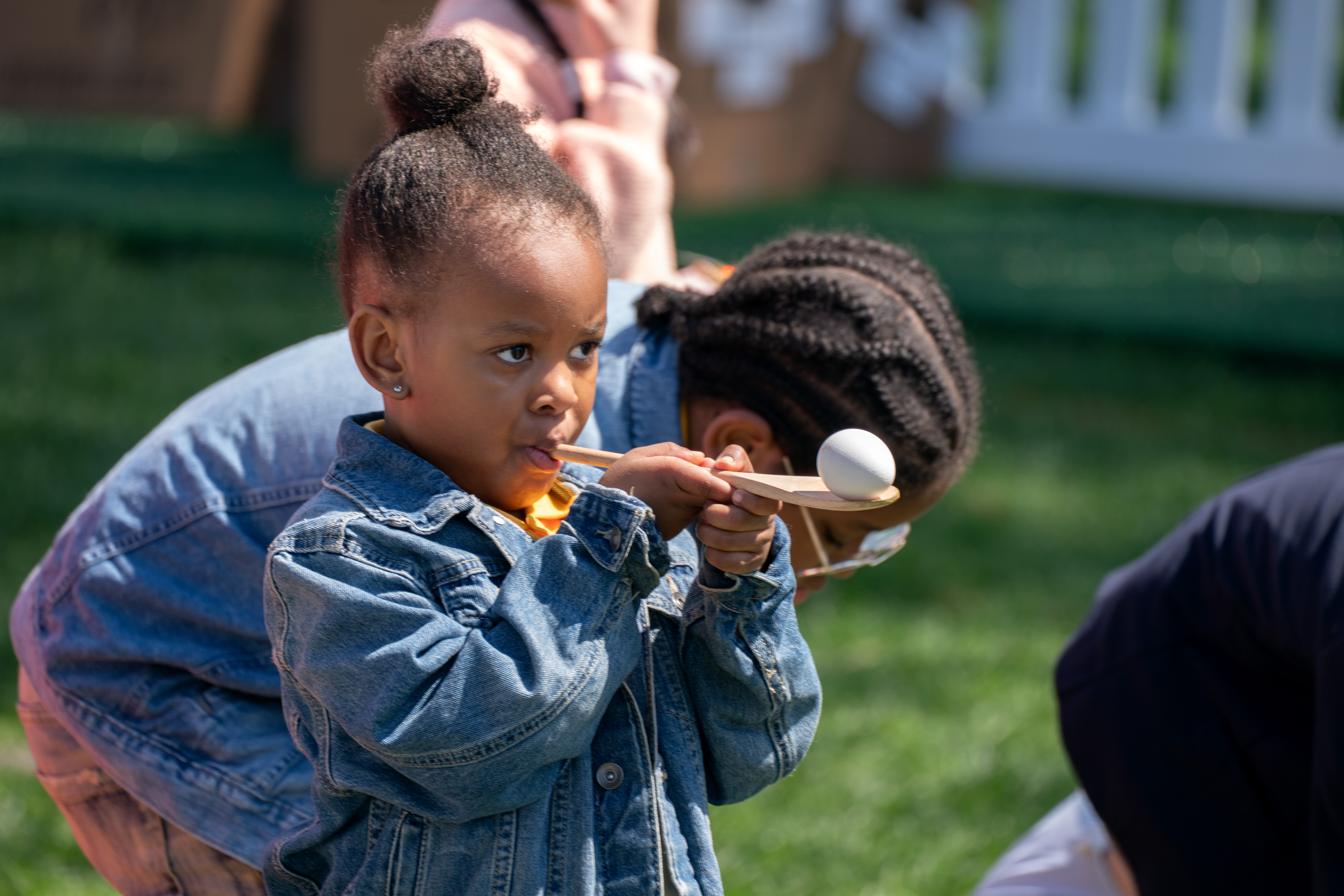 People attend the White House Easter Egg Roll on Monday. (Maxine Wallace/The Washington Post)
