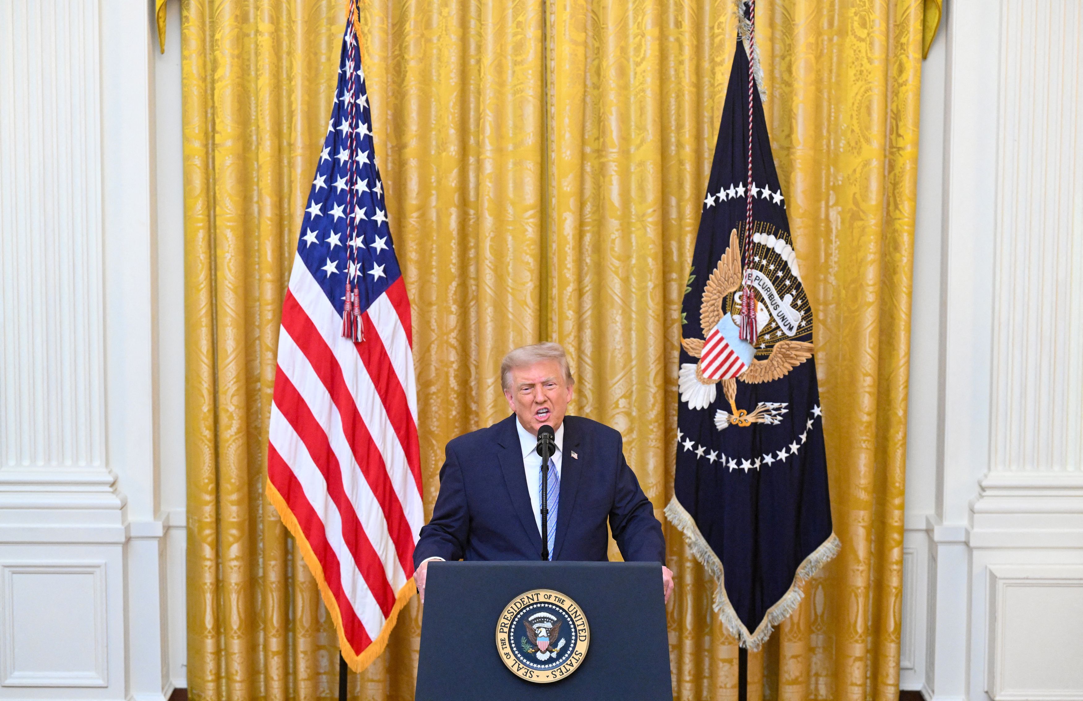 President Donald Trump speaks Thursday from the East Room. (Saul Loeb/Reuters)