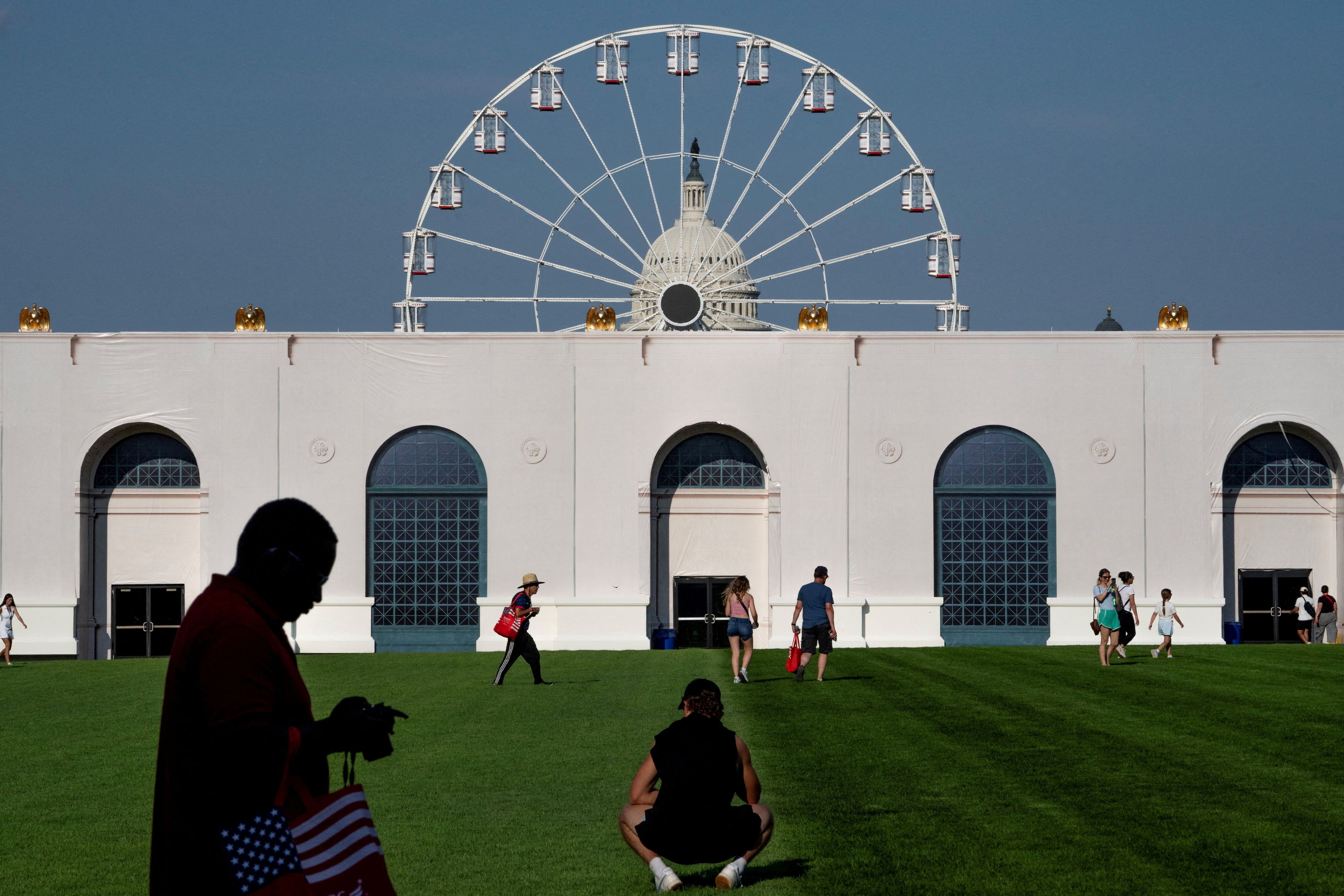 Visitors walk the grounds at the Great American State Fair on Thursday. (Nathan Howard/Reuters)