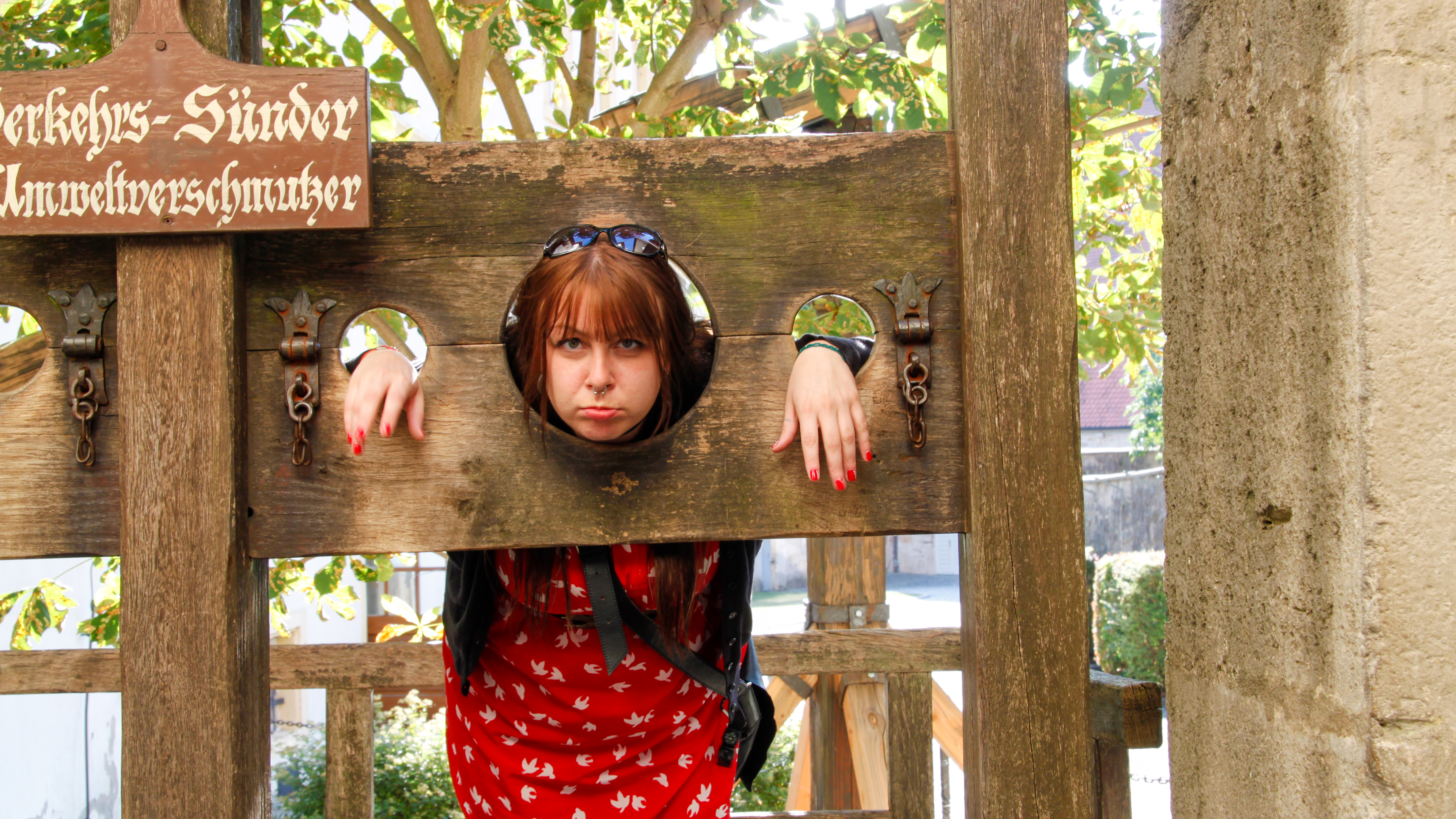 The pillory, with holes for head and hands, forced the accused to stand uncomfortably. Today, it’s a popular prop for tourist photos — a stark contrast to its original purpose. (Laura Van Deventer)