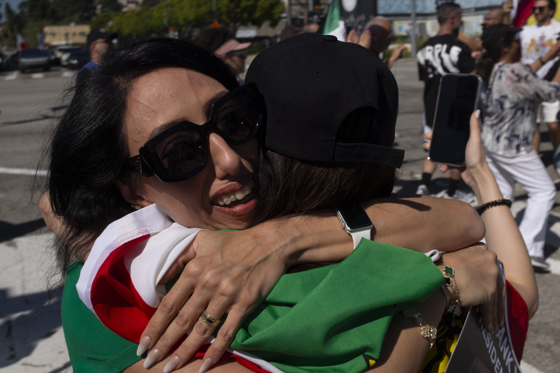 Iranian Americans in Los Angeles celebrate U.S. and Israeli strikes on Iran on Saturday. (N. Kirkpatrick/The Washington Post)