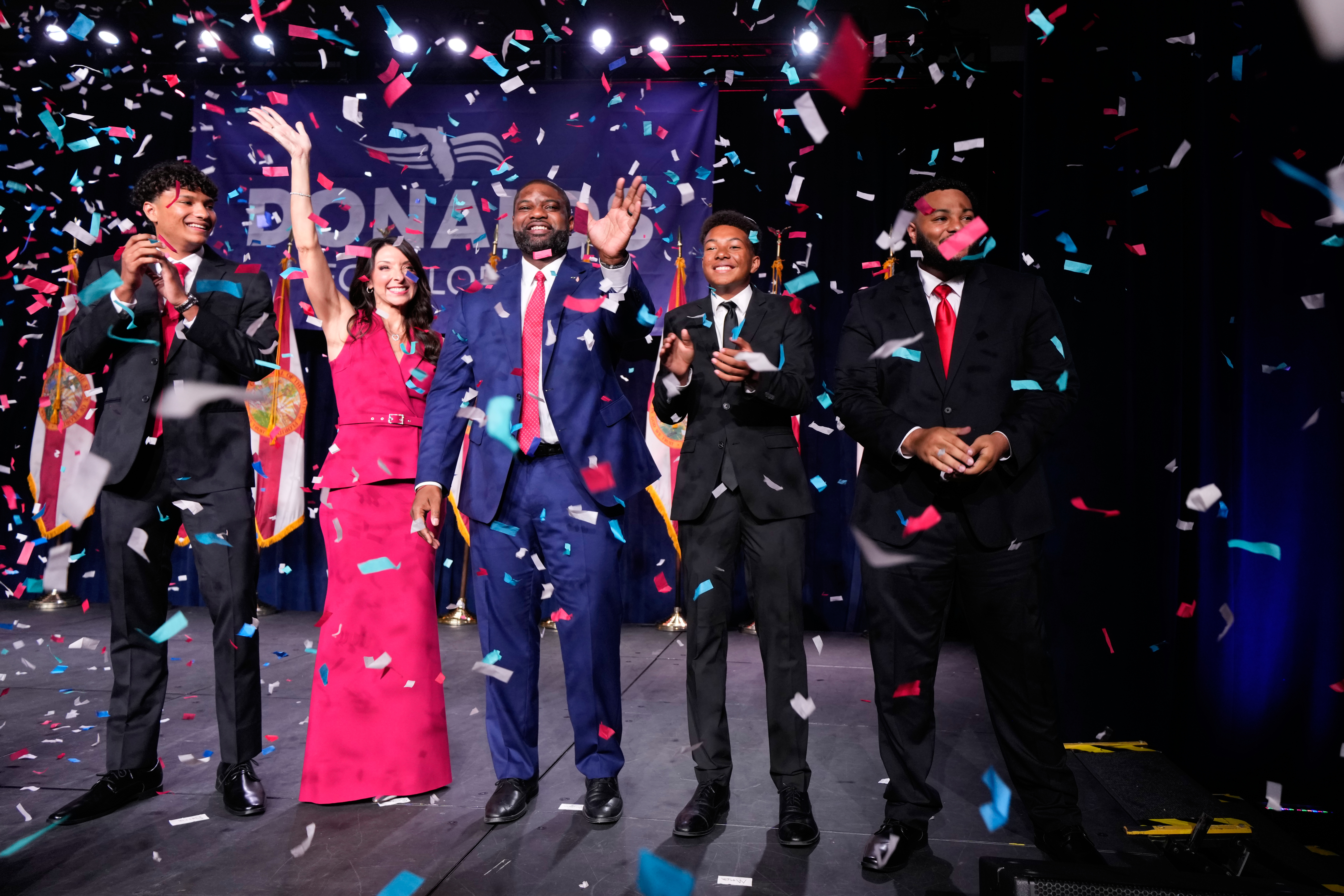 Florida Republican gubernatorial candidate Byron Donalds, center, stands with his family at a primary election party in Orlando. (John Raoux/AP)
