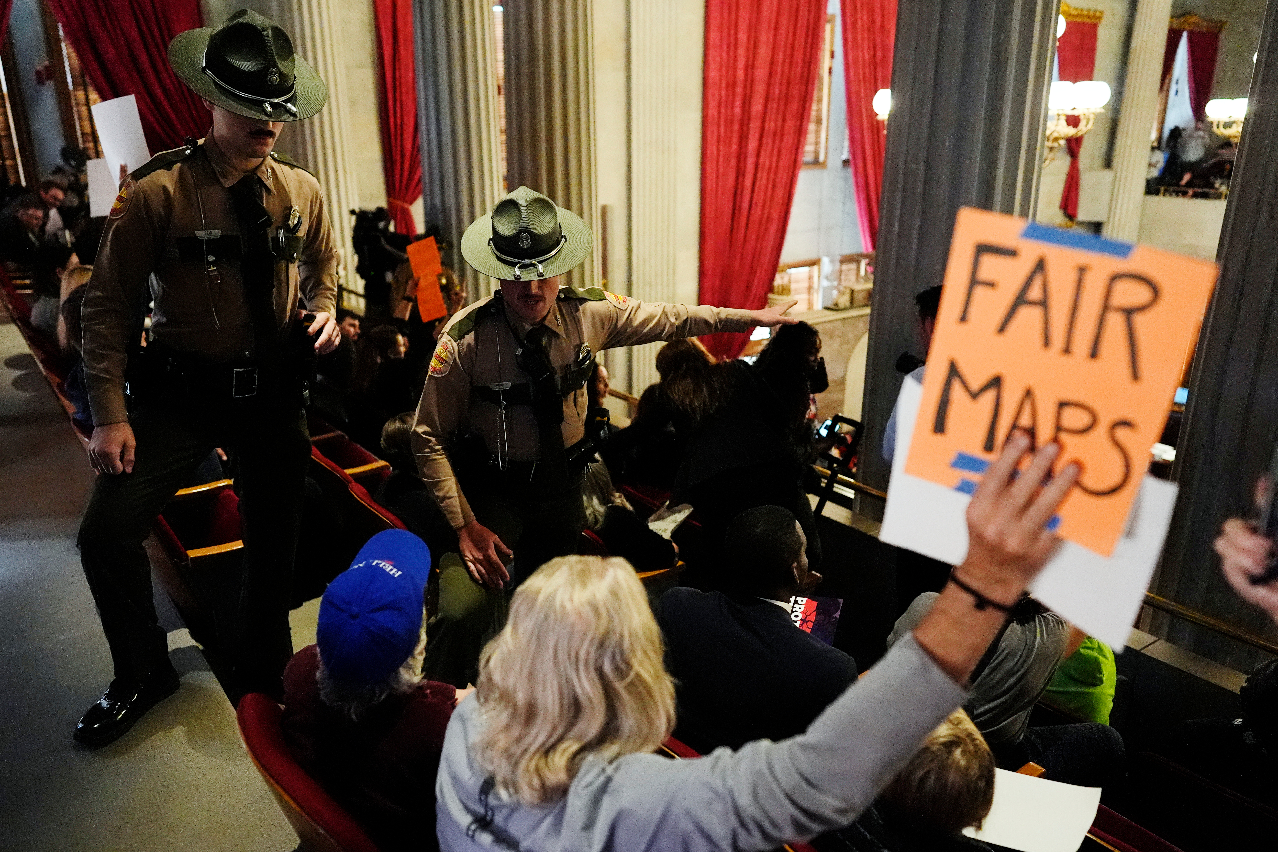 State troopers remove demonstrators from the Tennessee House gallery during a special session Thursday to redraw voting maps. (George Walker IV/AP)