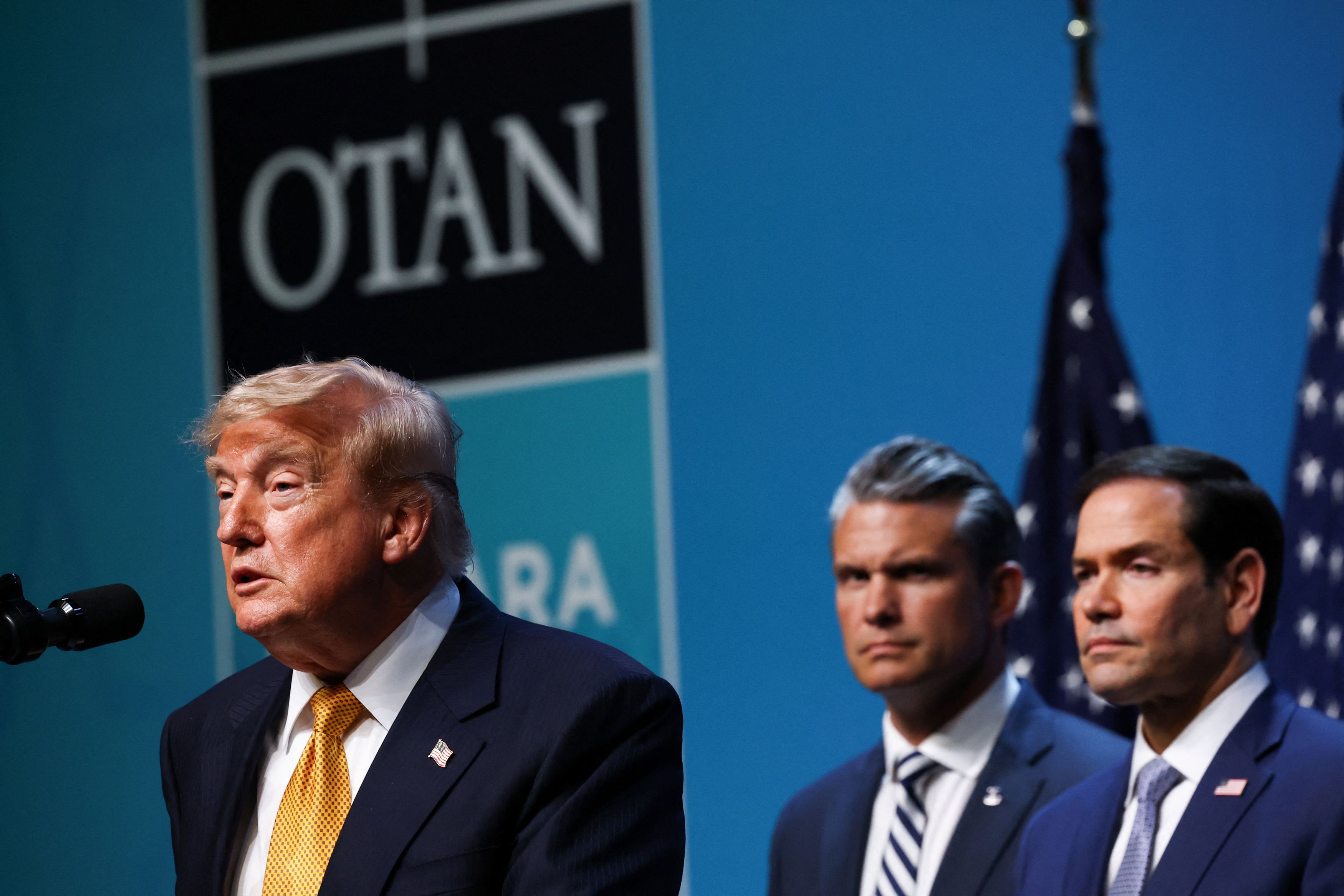 President Donald Trump on Wednesday at the NATO summit in Ankara, Turkey, with Defense Secretary Pete Hegseth, middle, and Secretary of State Marco Rubio. (Stoyan Nenov/Reuters)